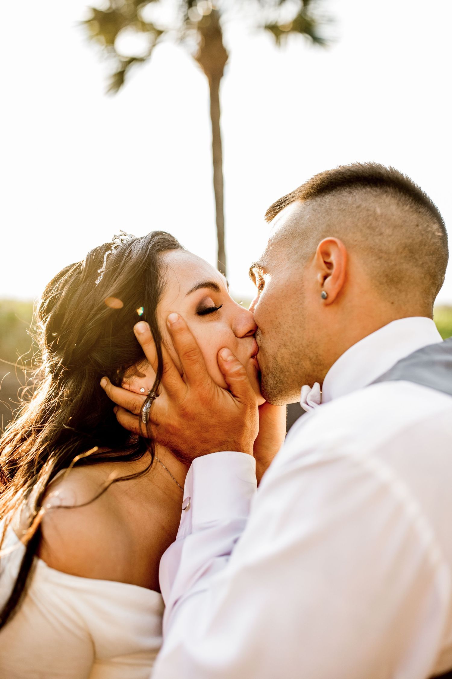 Colorado & destination wedding photographer capturing candid bride and groom moments during an emotional wedding day celebration.