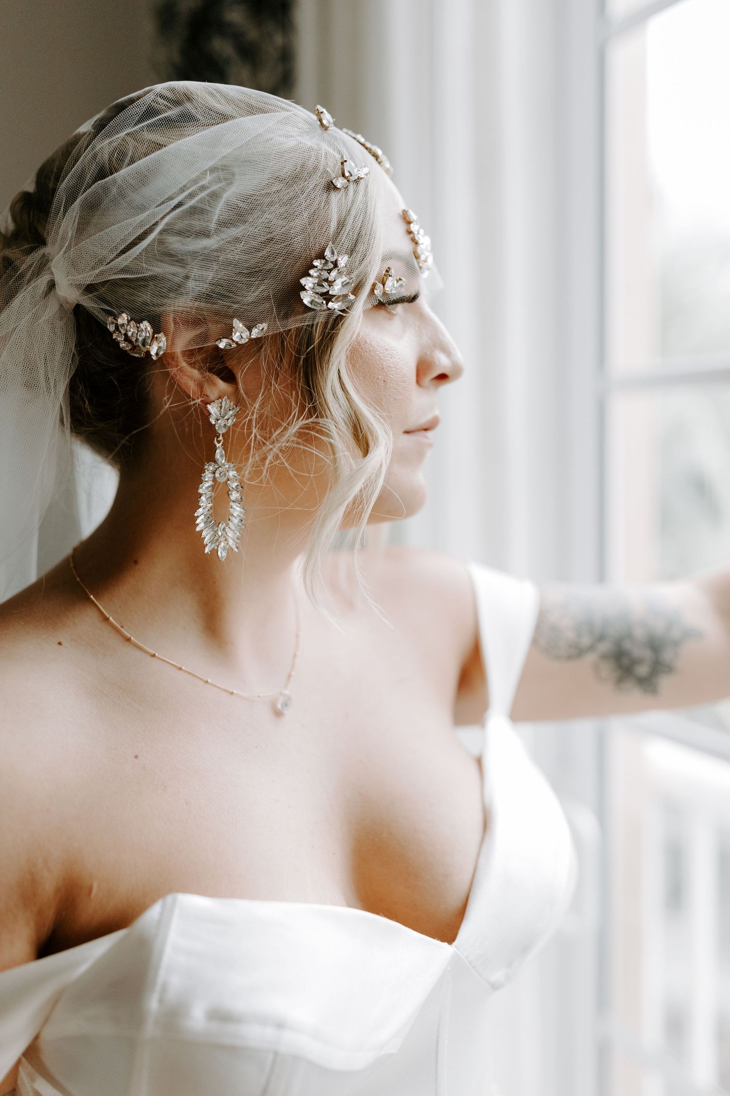 Colorado & destination wedding photographer capturing candid bride and groom moments during an emotional wedding day celebration.