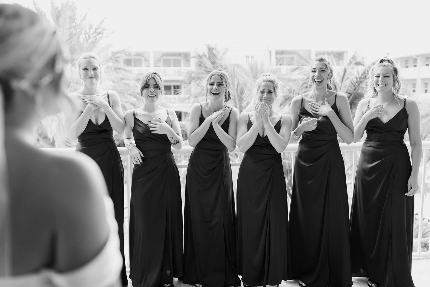 Colorado & destination wedding photographer capturing candid bride and groom moments during an emotional wedding day celebration.