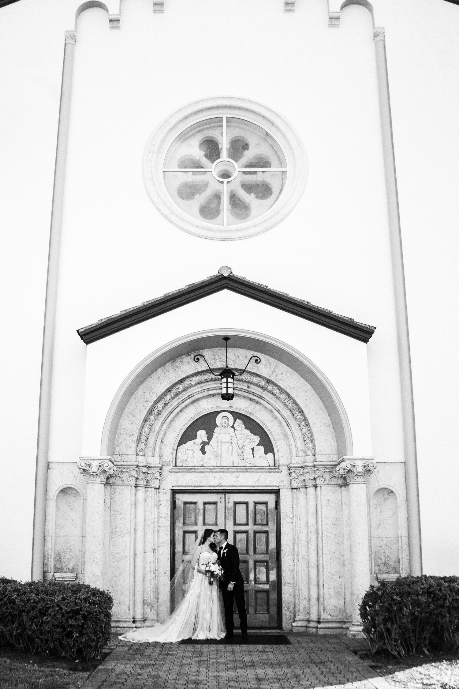 Colorado & destination wedding photographer capturing candid bride and groom moments during an emotional wedding day celebration.