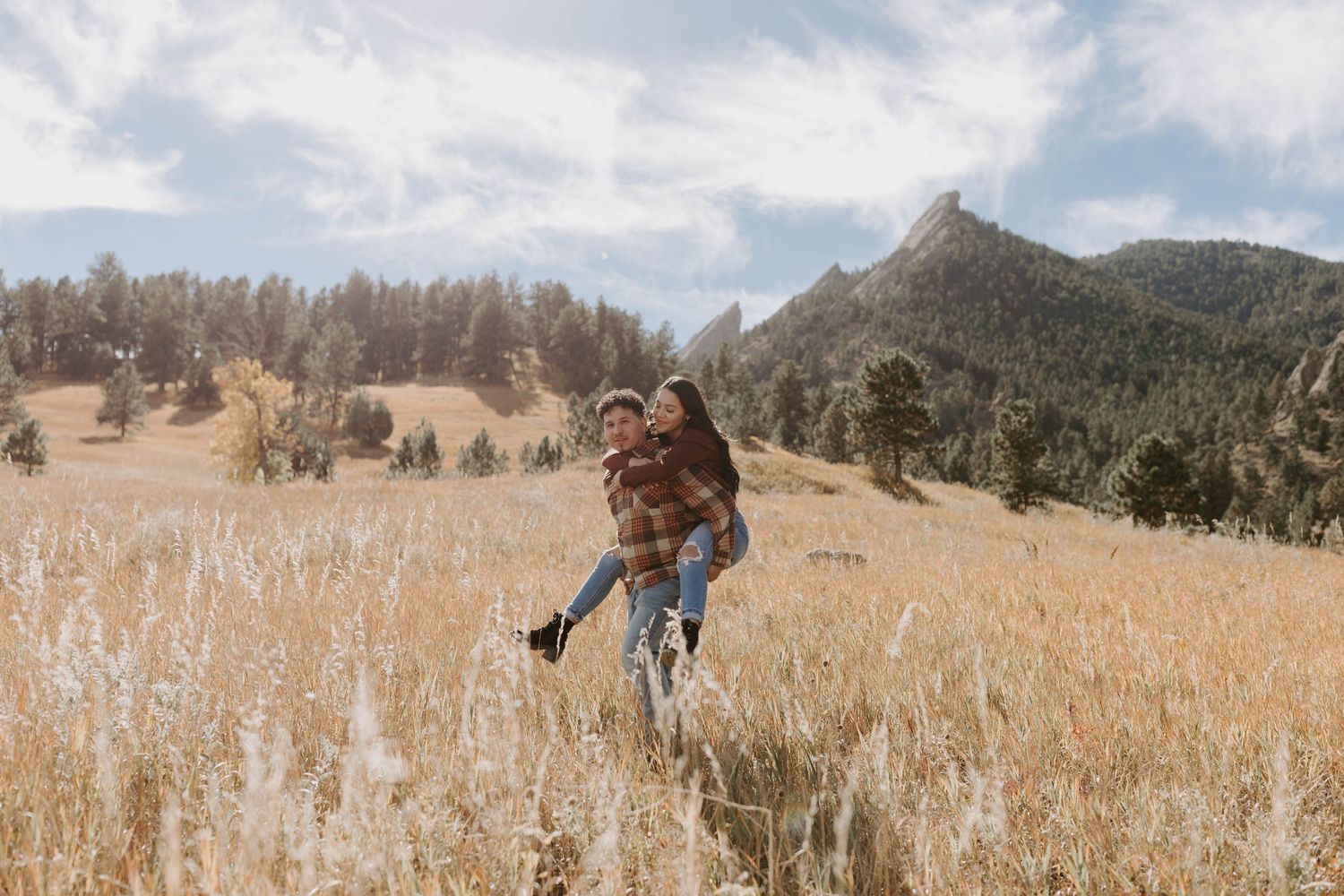 Colorado couples photographer documenting authentic engagement and lifestyle moments in natural outdoor scenery.