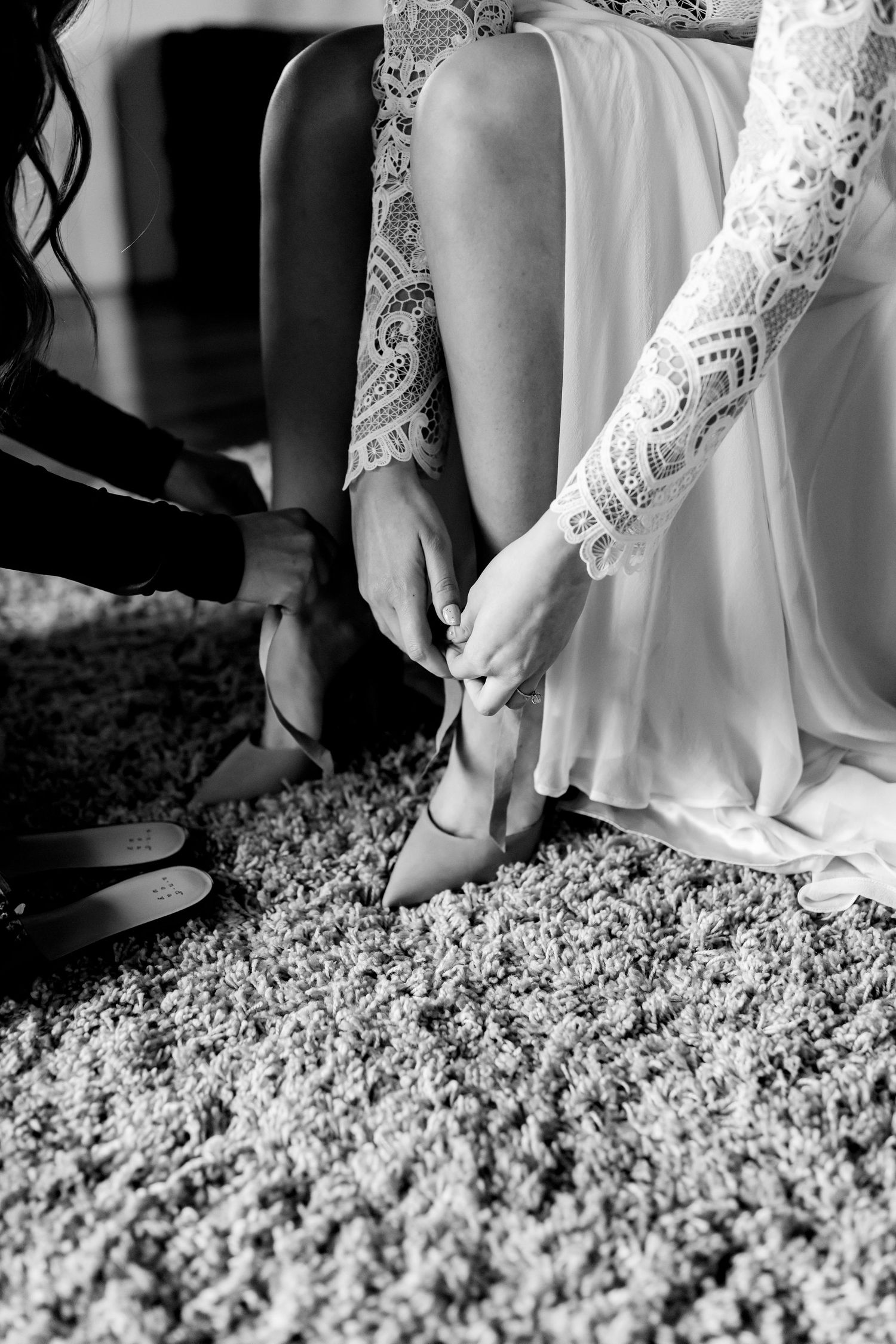 Colorado & destination wedding photographer capturing candid bride and groom moments during an emotional wedding day celebration.