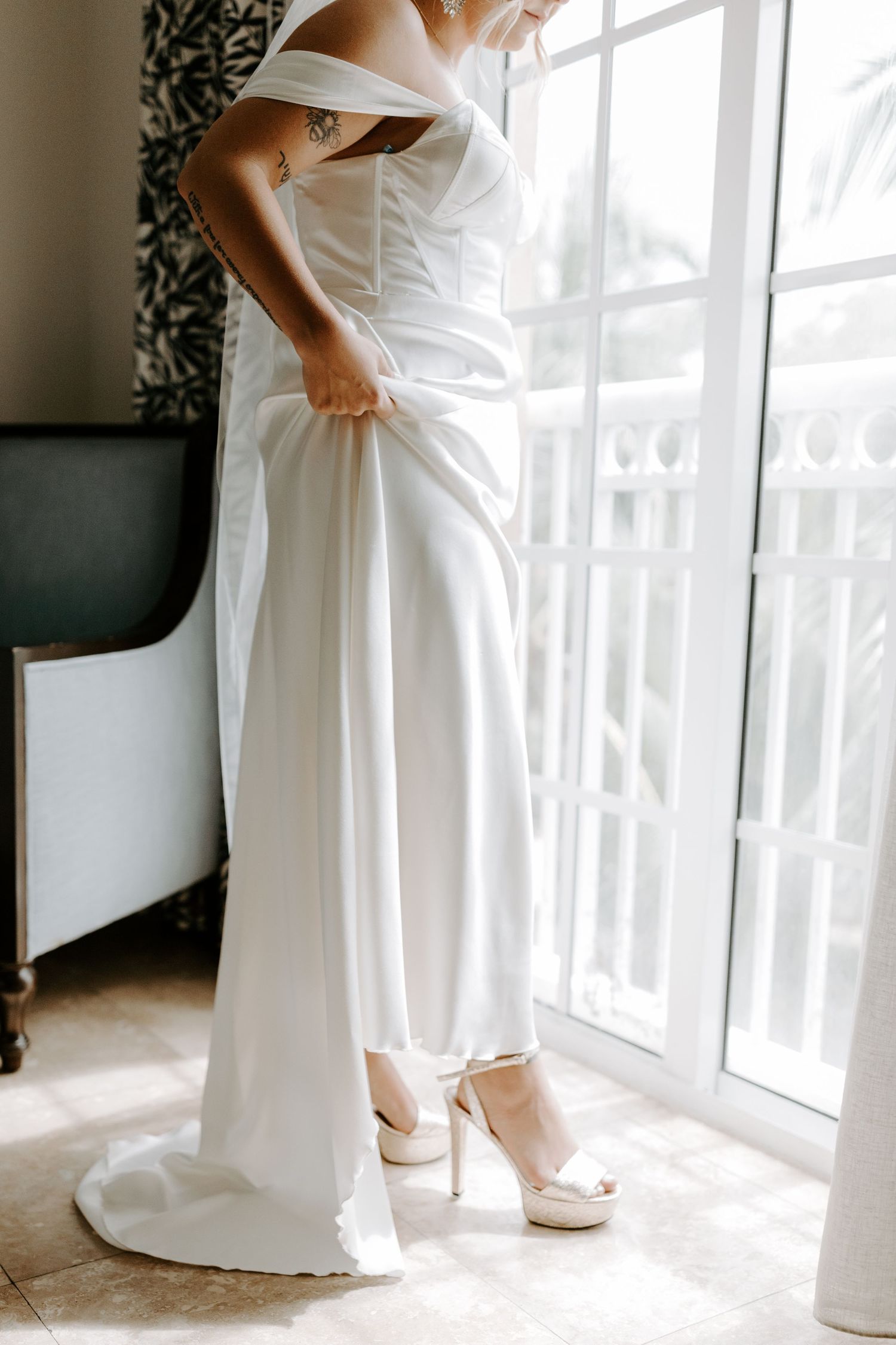 Colorado & destination wedding photographer capturing candid bride and groom moments during an emotional wedding day celebration.
