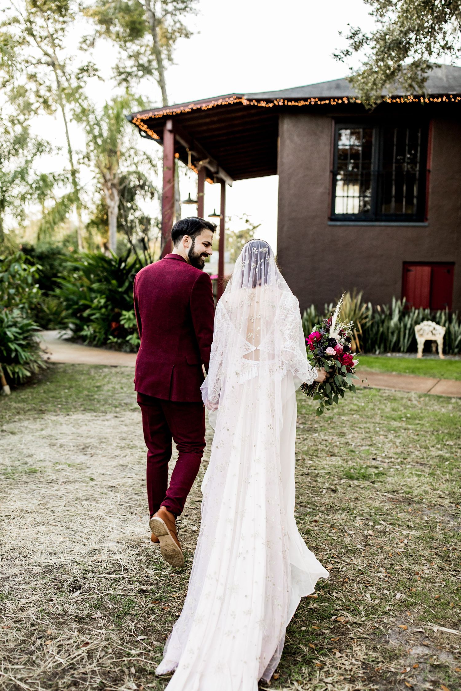 Colorado & destination wedding photographer capturing candid bride and groom moments during an emotional wedding day celebration.