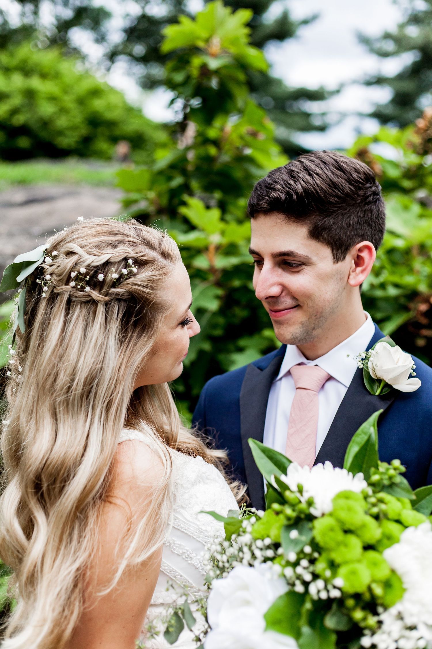 Colorado & destination wedding photographer capturing candid bride and groom moments during an emotional wedding day celebration.