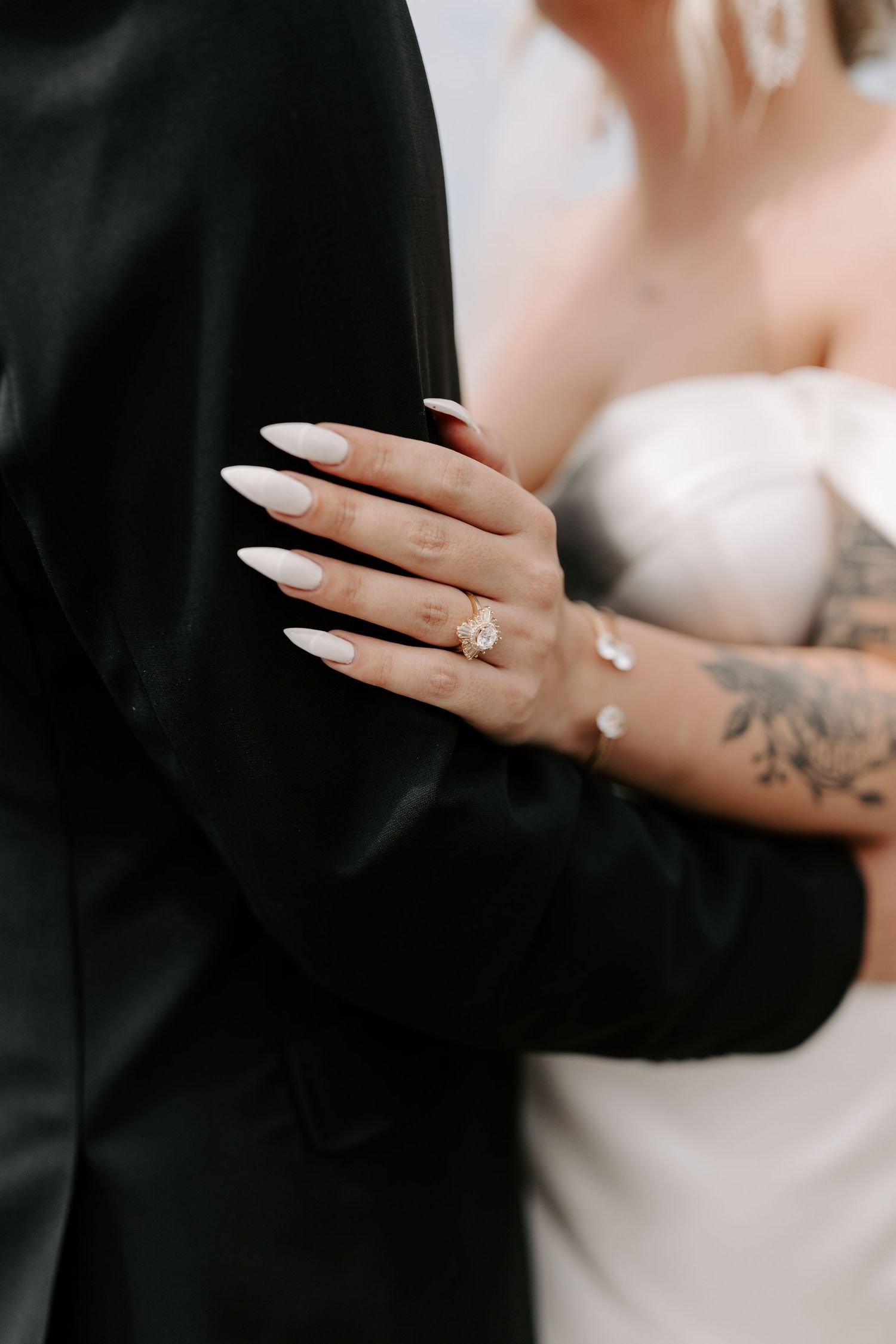Colorado & destination wedding photographer capturing candid bride and groom moments during an emotional wedding day celebration.