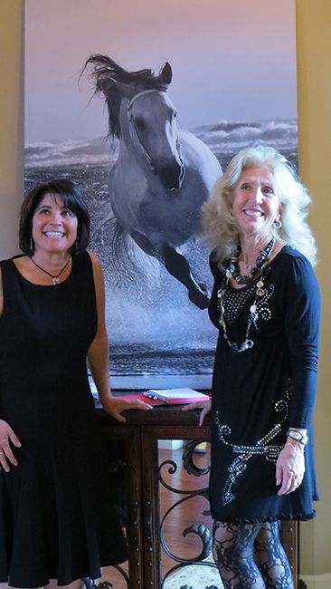 Photographer, Jody Miller and friend Julie Jennings at in home private art gallery show