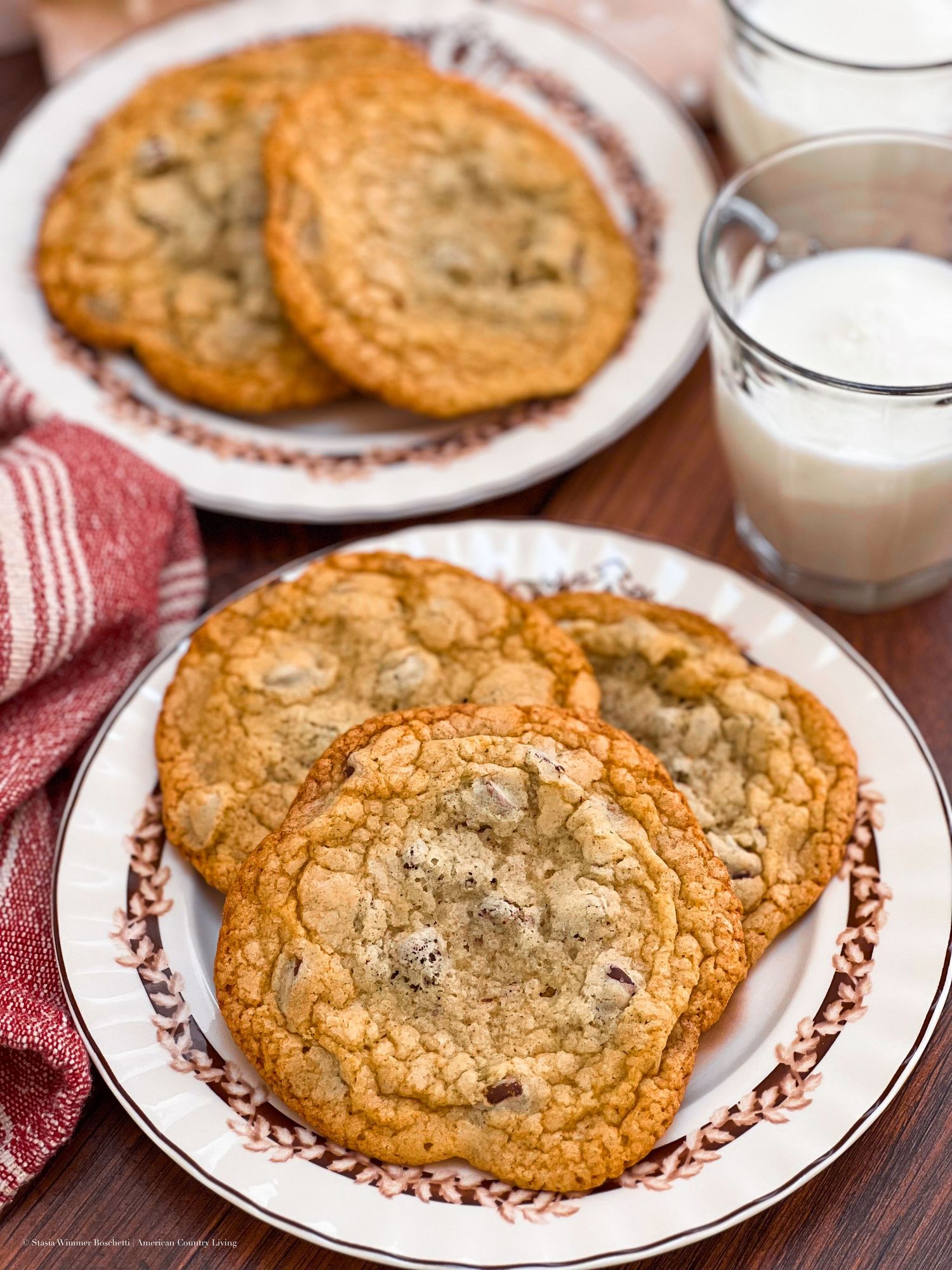 Multiple views of perfectly baked chocolate chip cookies arranged on vintage-style plates.