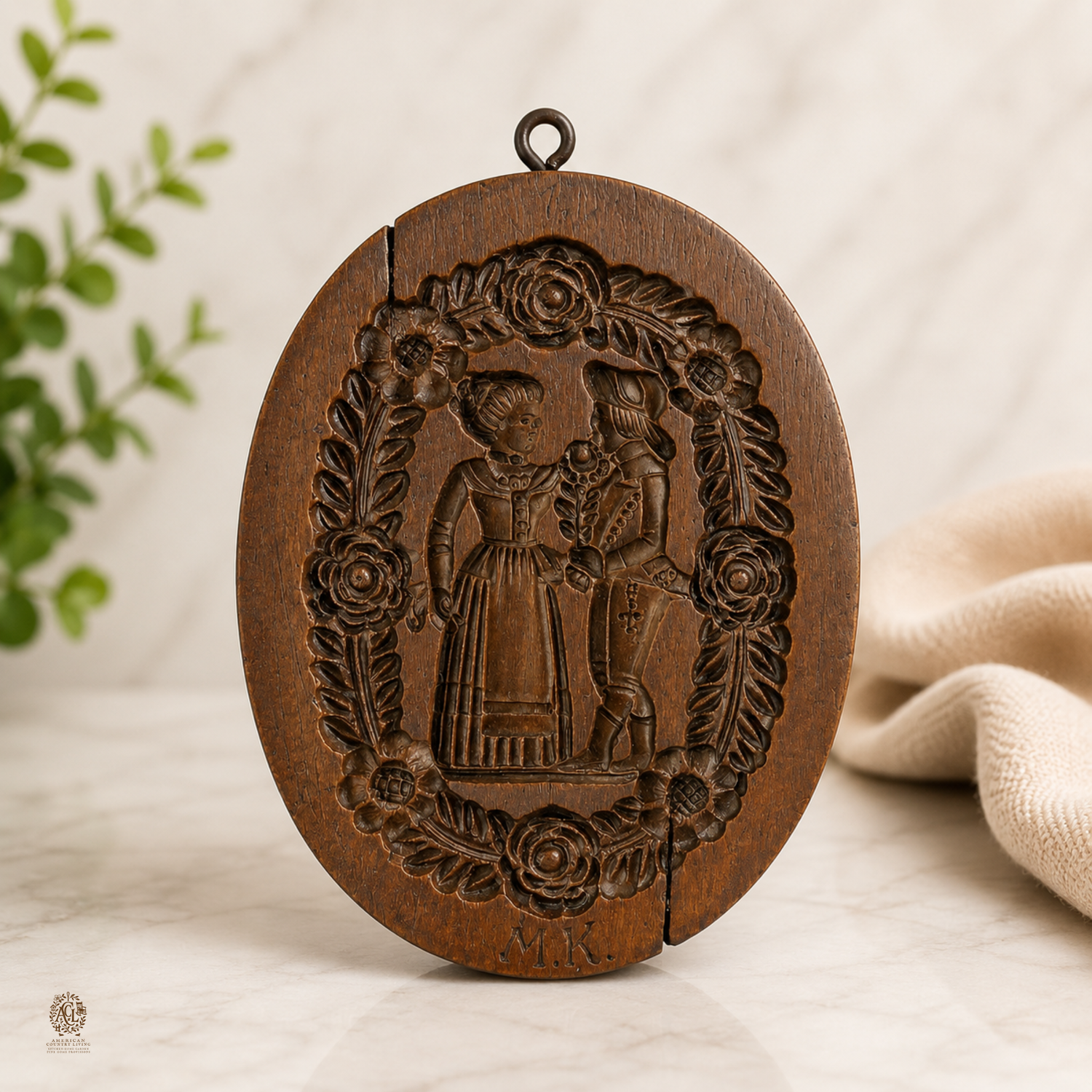 Vintage brown coffee grinder with wooden handle and eggs on white plate with decorative brown border pattern.