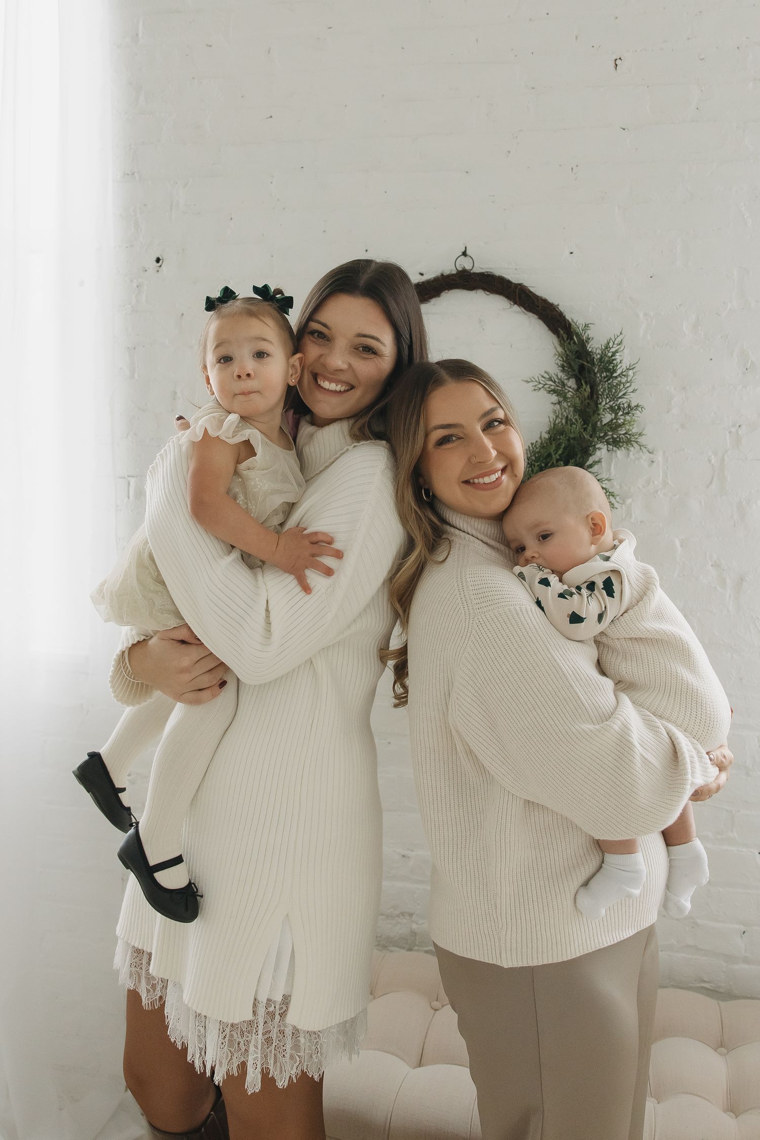 best friends smiling with their babies