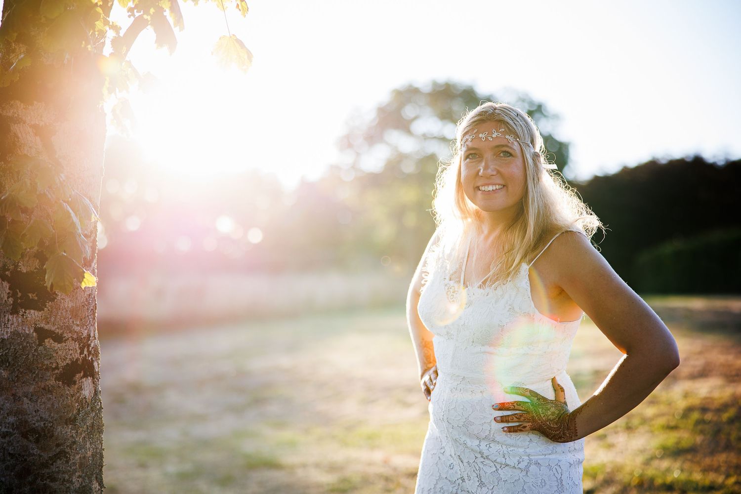 Sun-drenched portrait in a natural outdoor setting.