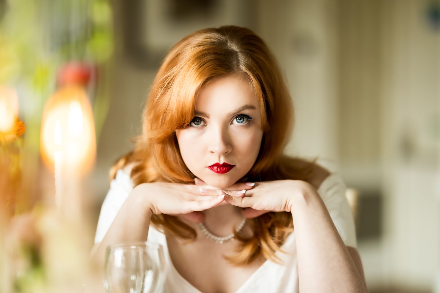 Romantic bridal portrait with soft lighting and vintage-inspired styling.