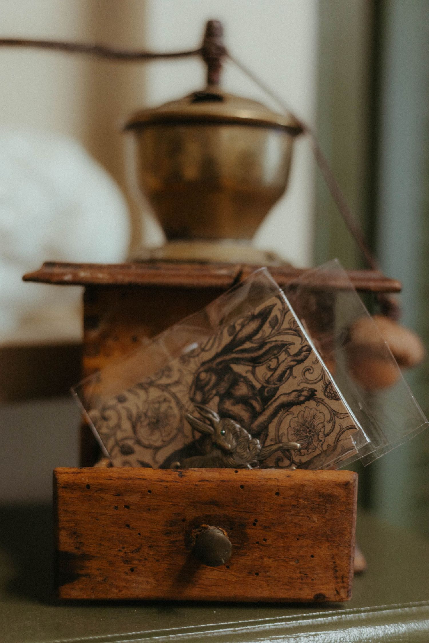 detail shot of a tattoo studio of a silver plague with a hare