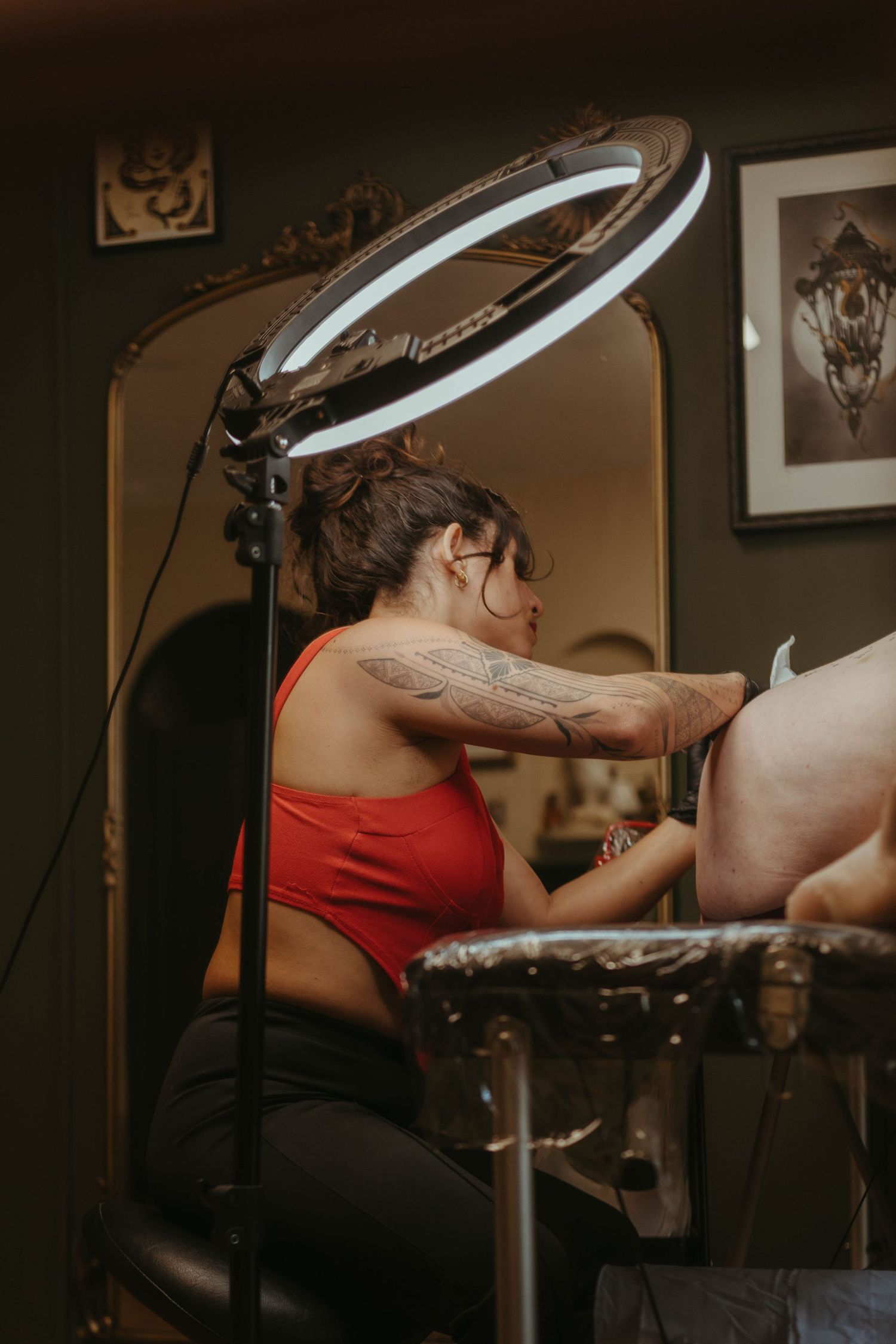 Photograph of tattoo artist ambroart working in a studio in Cork