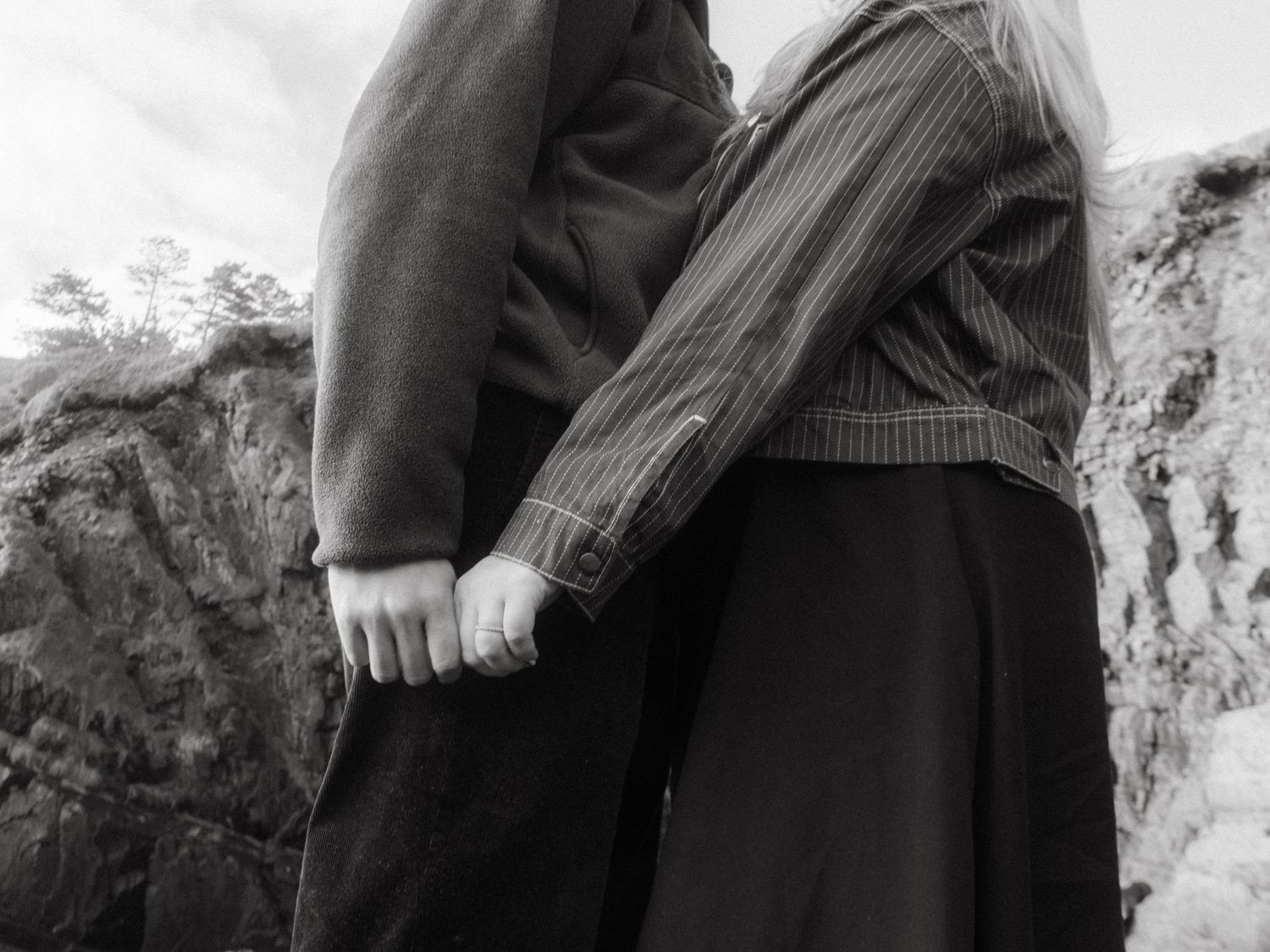 Photograph of couple posing at Nohoval Cove in Cork, Ireland.