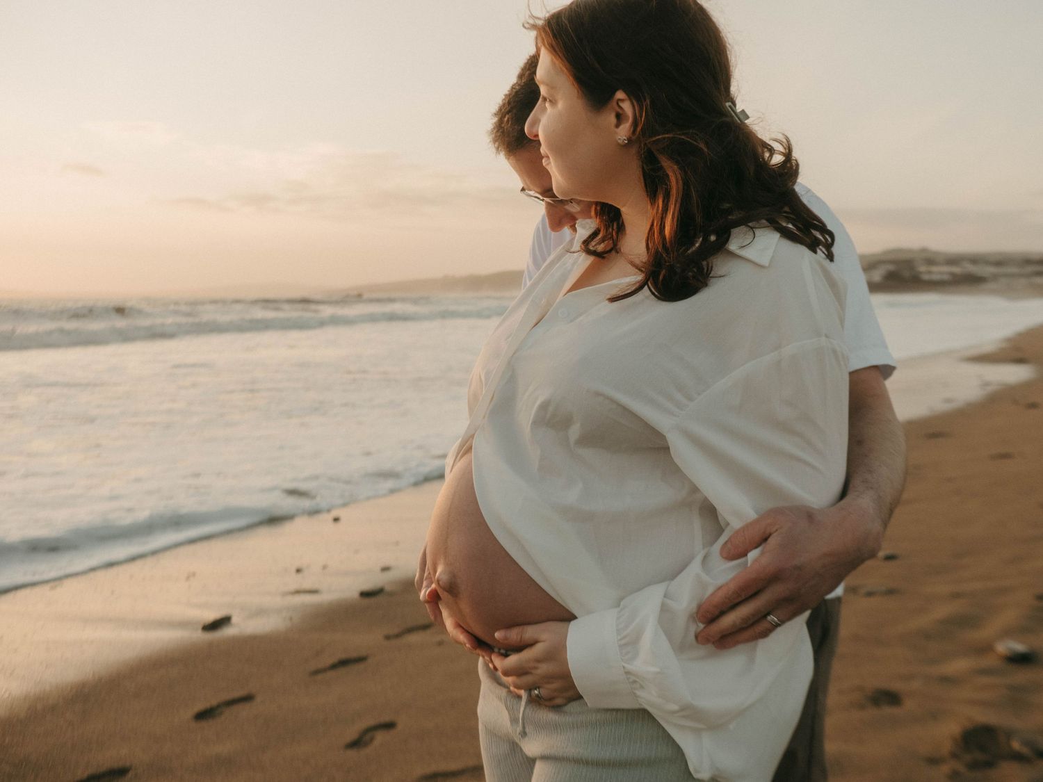 Photograph of pregnant woman at a beach in Cork