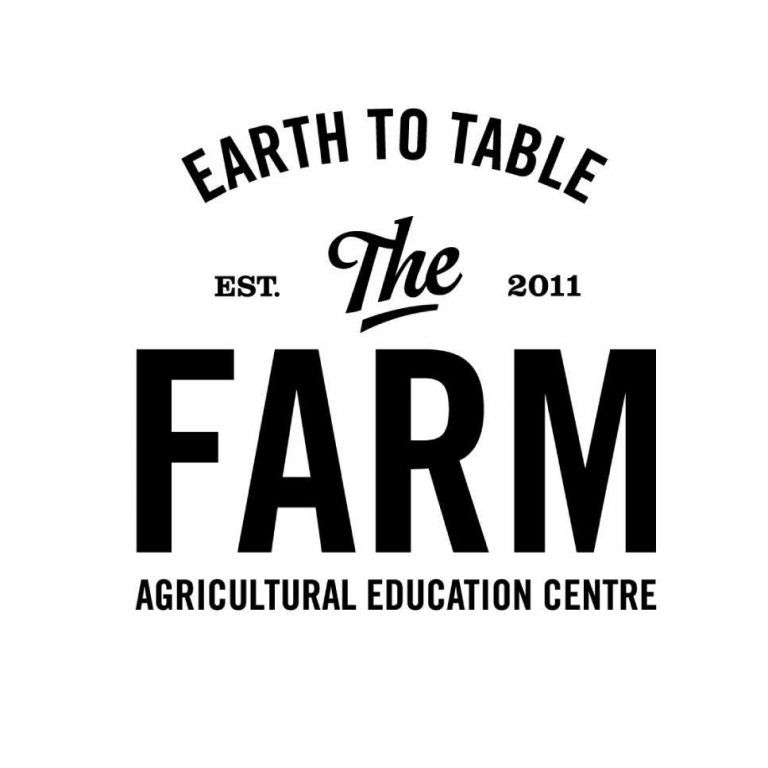 Black text logo for The Farm agricultural education center with Earth to Table branding.