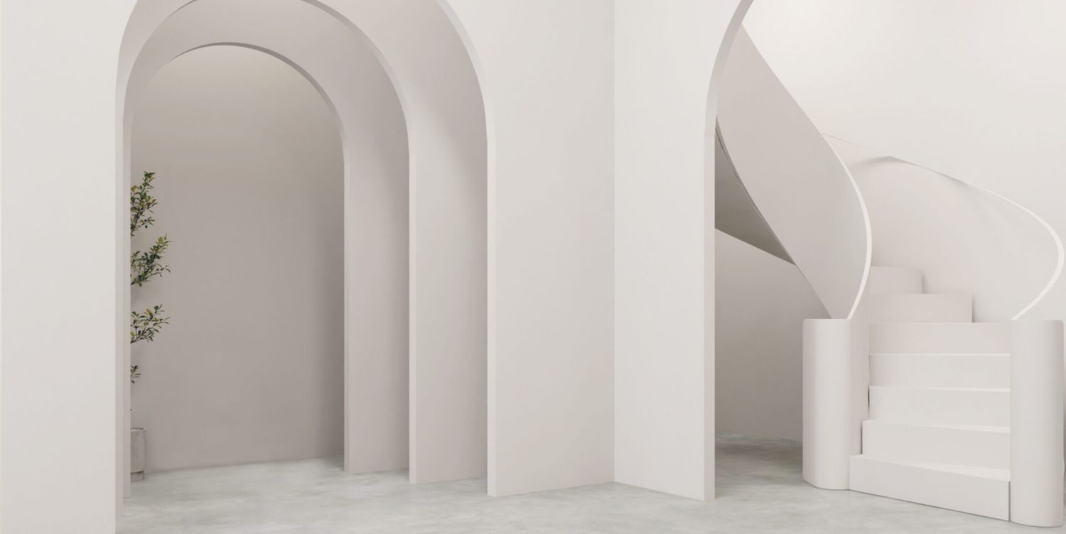 Minimalist white architectural space with curved archways and clean lines creating a serene environment. Monet Studio, Richmond Hill toronto
