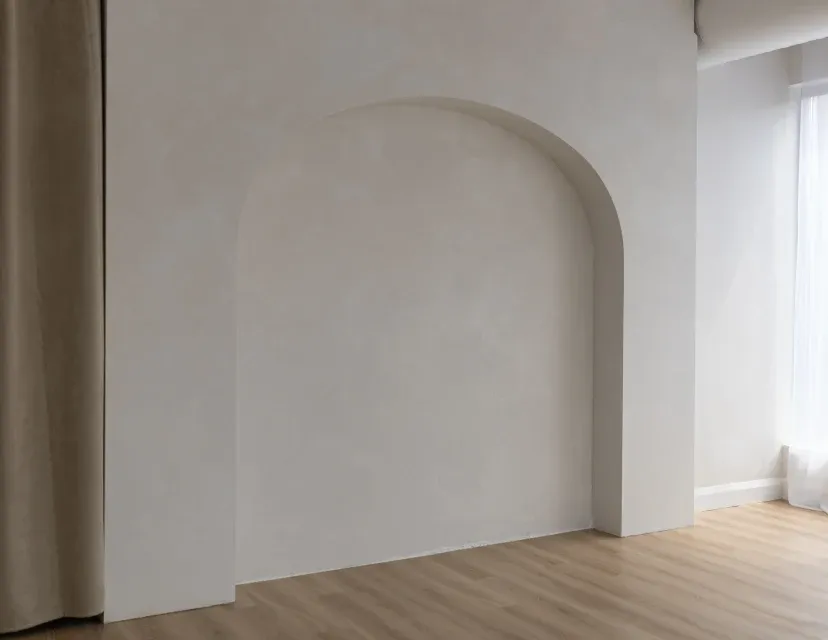 White interior room with curved archway and tall windows letting in natural light from the right side. Light Haus Studio, Mississauga