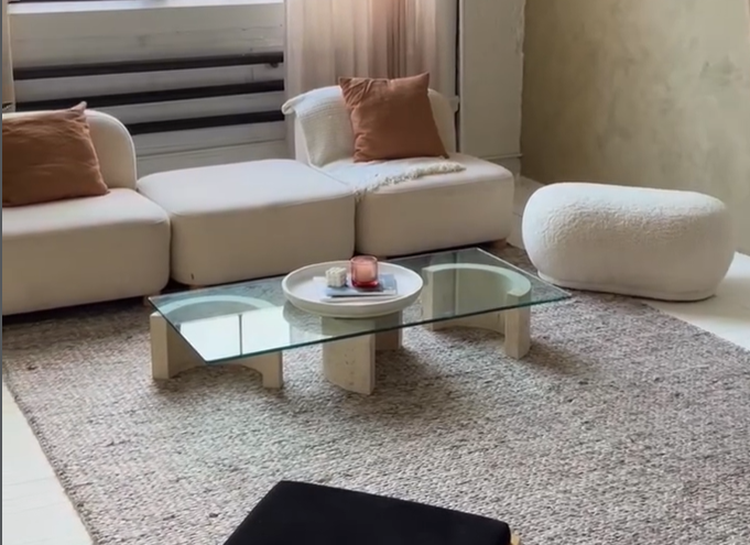 A series of photos showing a modern living room interior with beige carpet, glass table, and white decor elements. Summer Set Studio Toronto