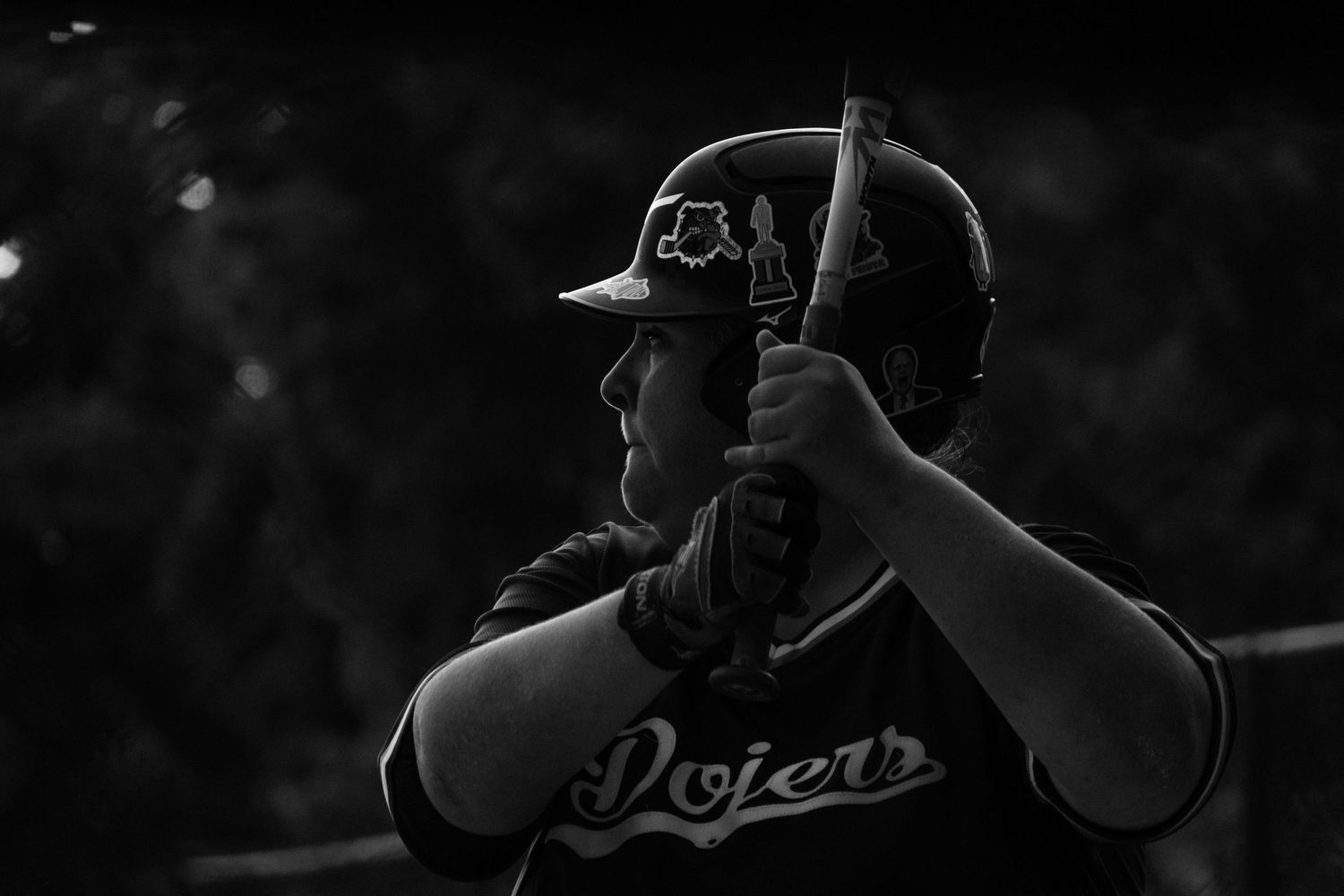 Black and white close-up of a Dodgers baseball player in batting stance holding bat ready to swing.