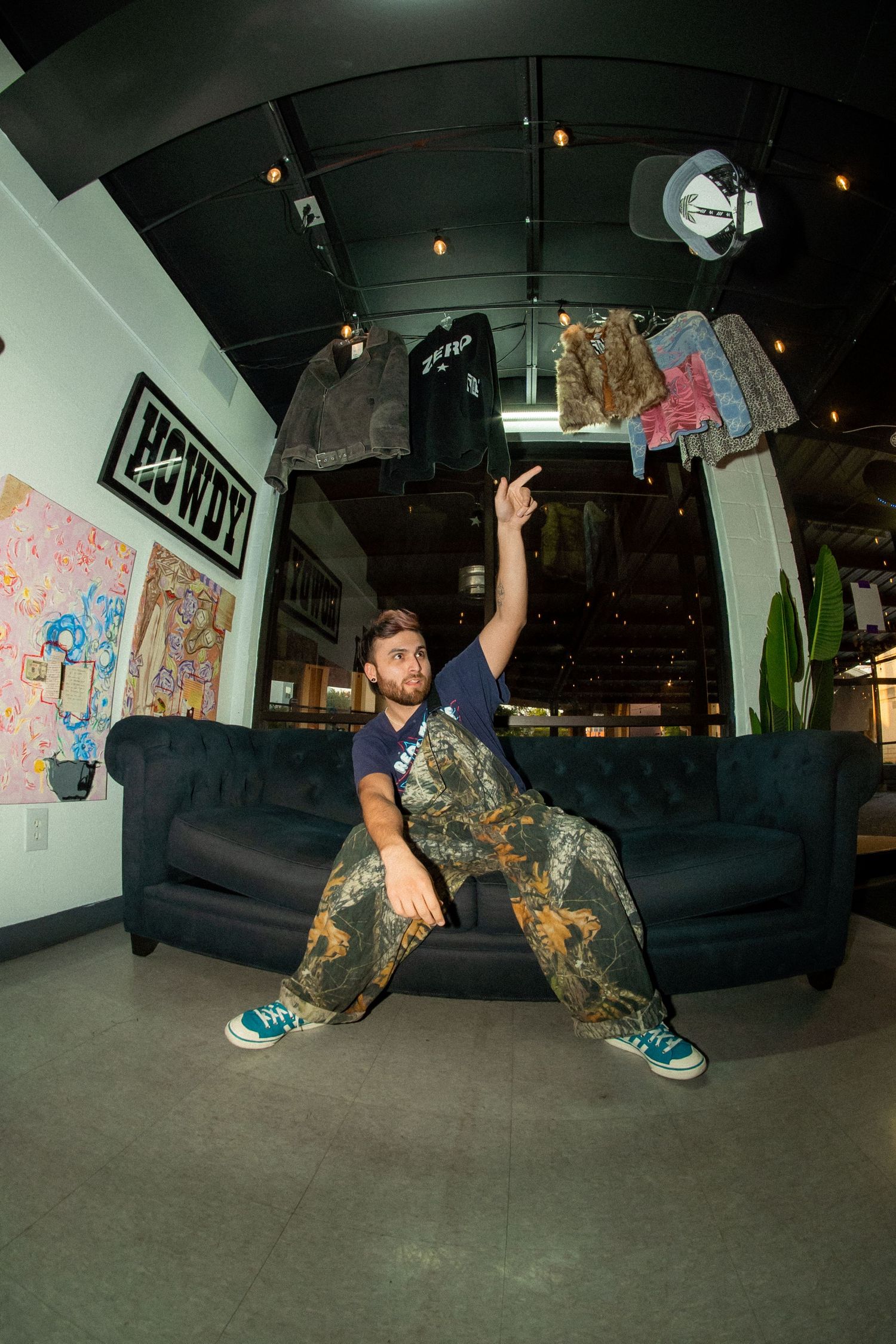 Series of dynamic breakdancing moves performed on indoor floor with graffiti art backdrop.
