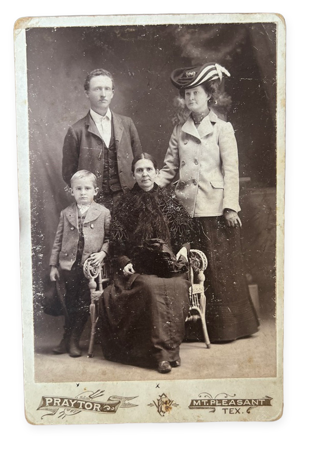 Antique cabinet card photo of a Victorian family of four from Praytor studio in Mt. Pleasant, Texas.