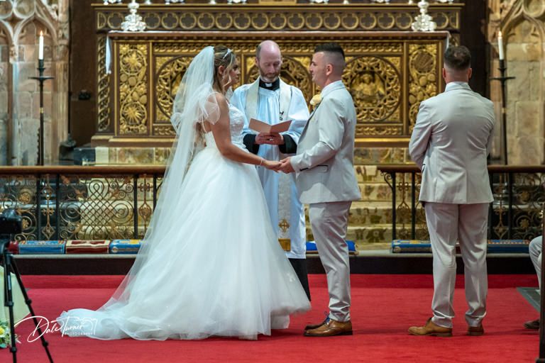 Wedding ceremony moments captured in sequence along cathedral's decorated altar area.