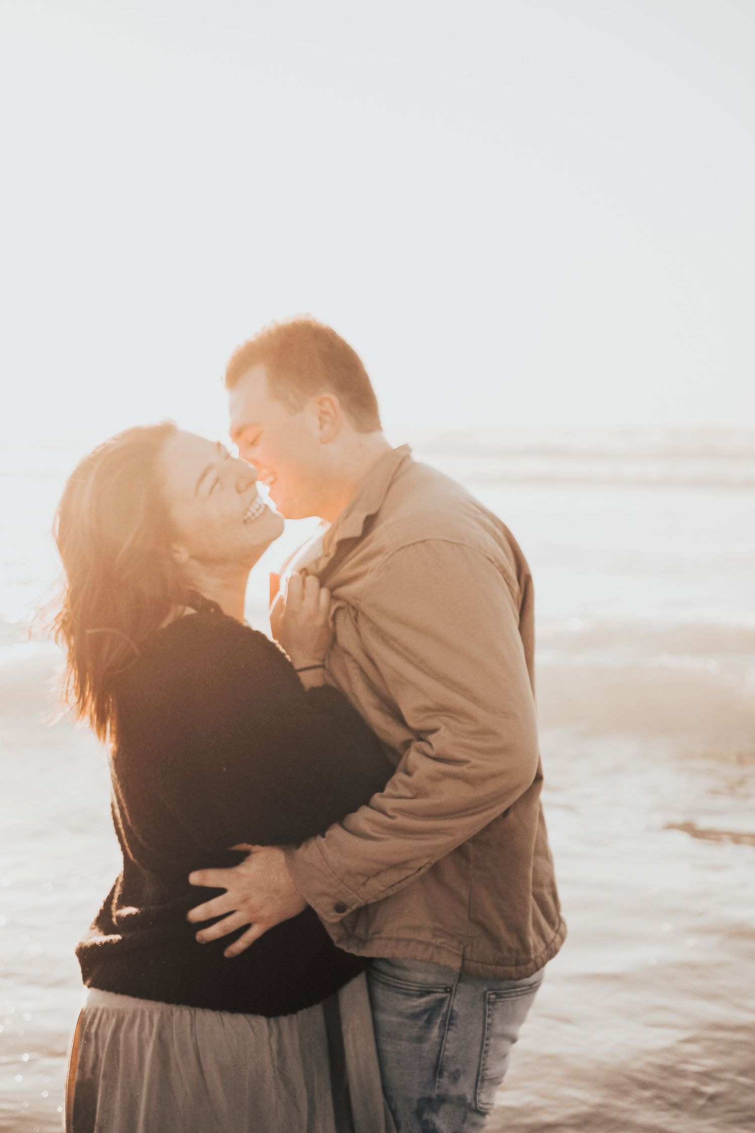 couple in ocean in Encinitas, California