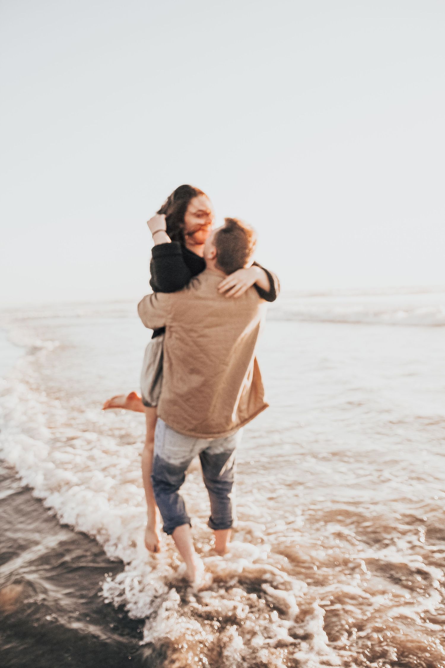 couple in ocean in Encinitas, California