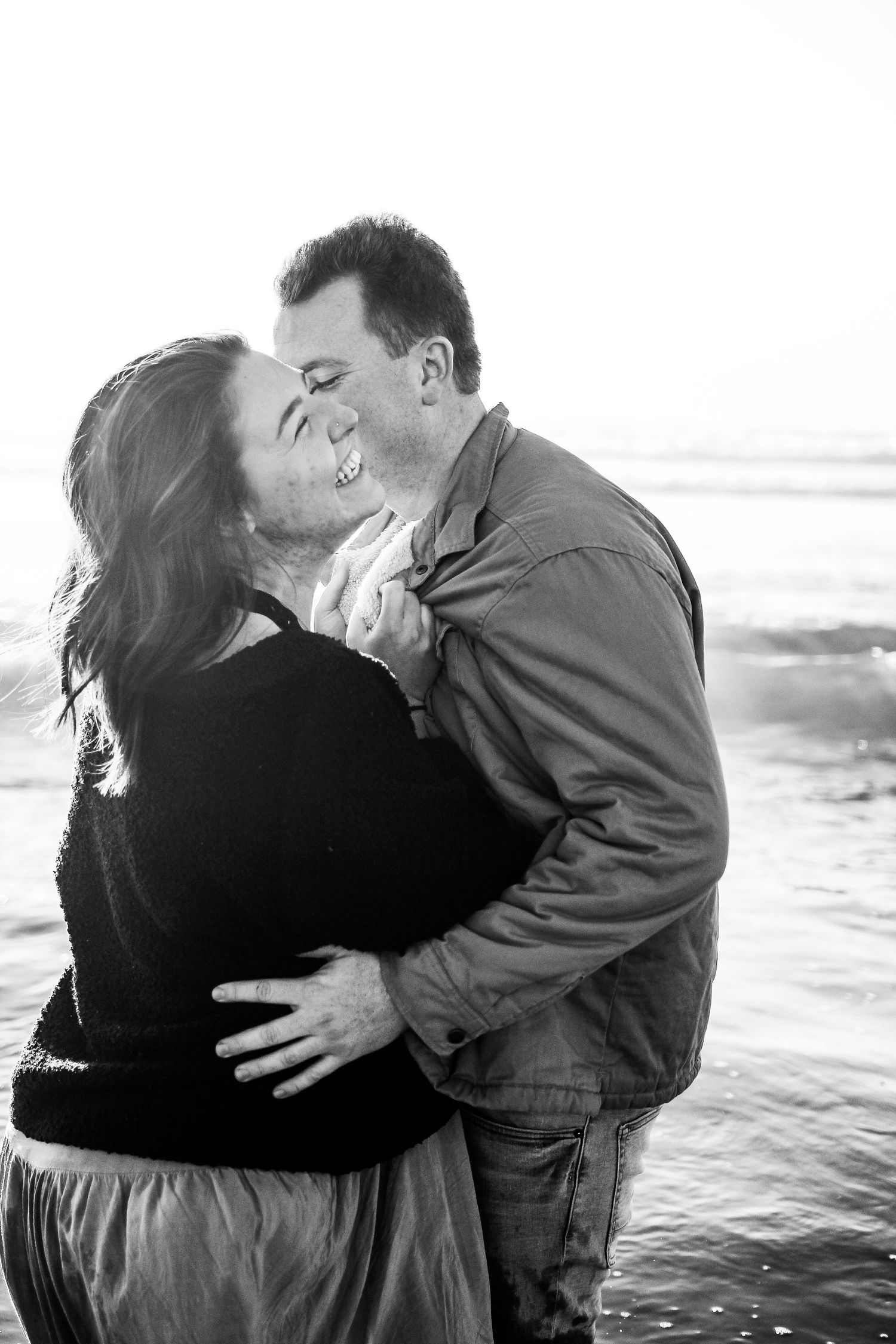 man and woman on beach in Encinitas, California
