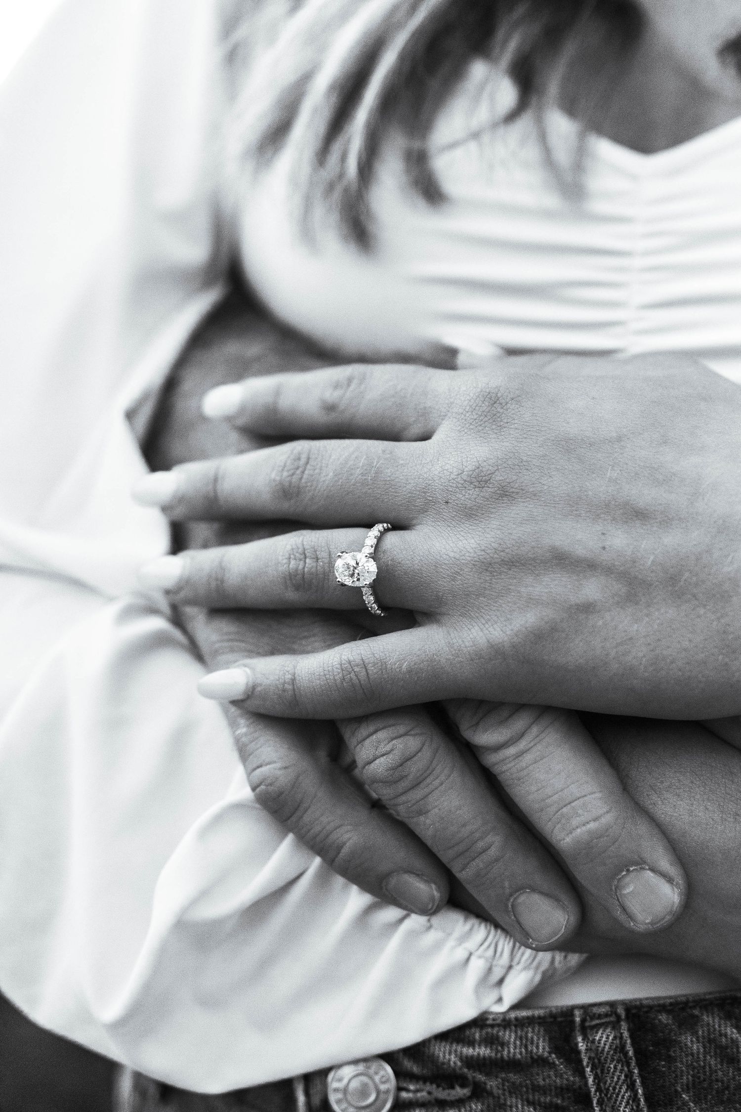 up close photo of a woman's engagement ring