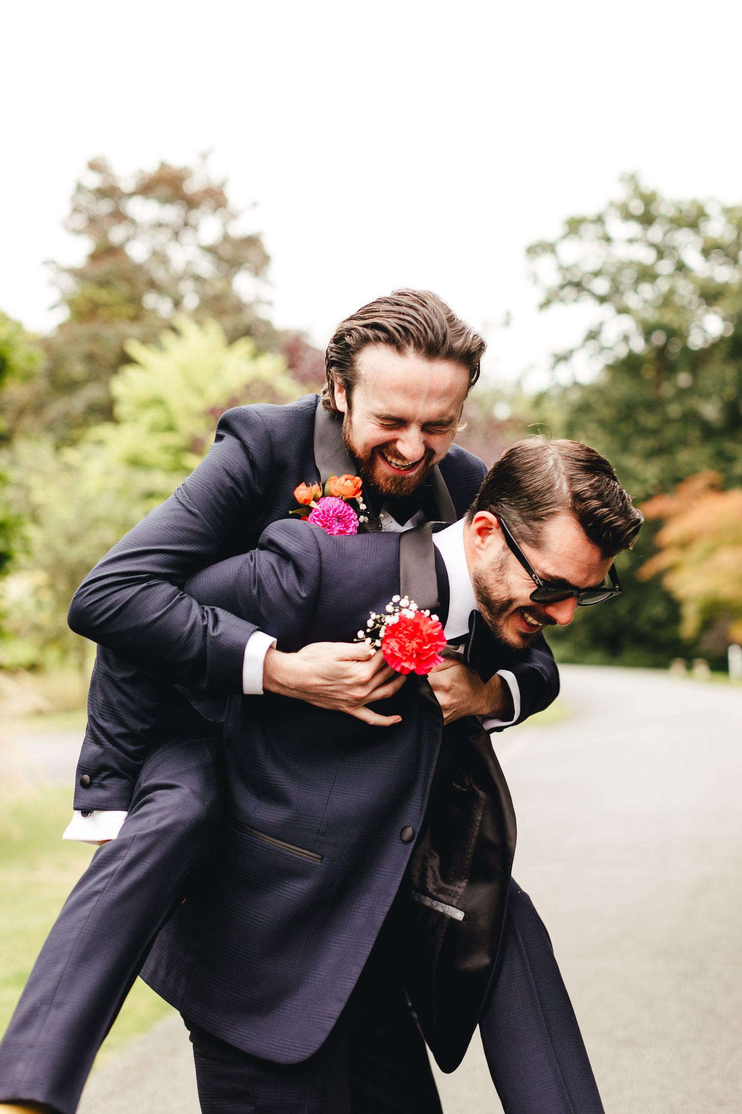 Barnett Hill Hotel Surrey groom candid moment, relaxed summer wedding photography at luxury country house