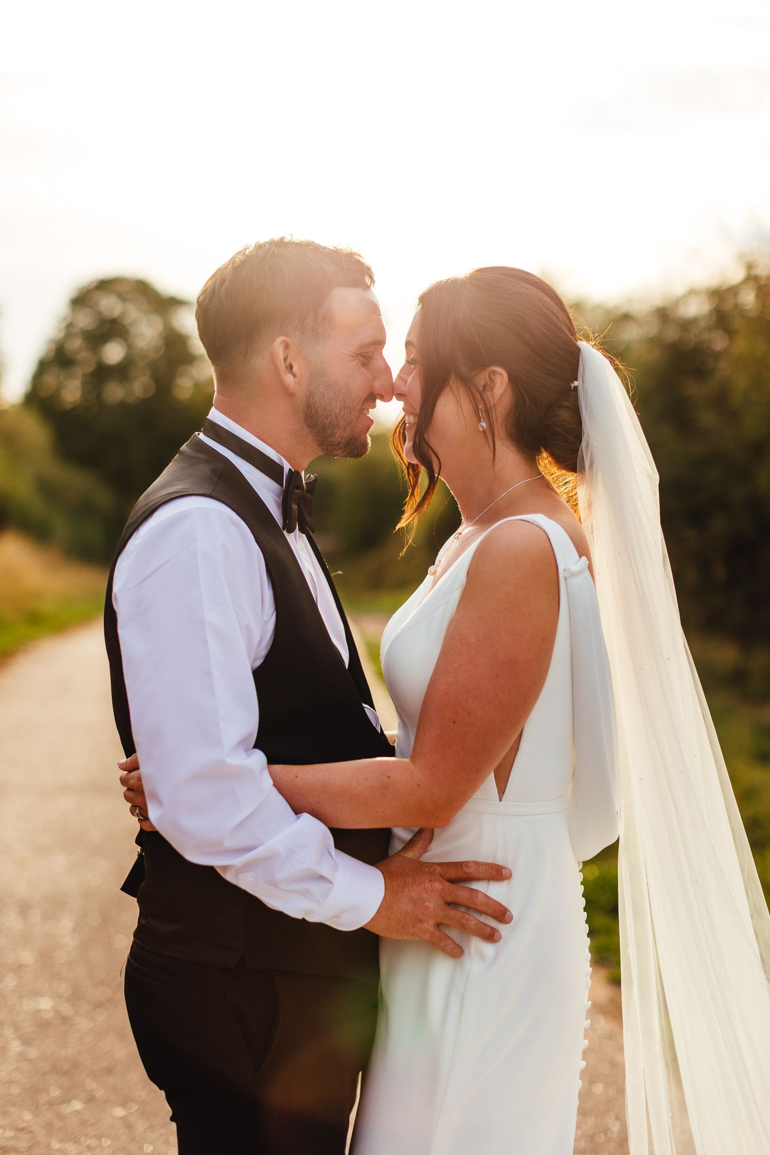Golden hour wedding portrait at Inkersall Grange Farm, Derbyshire wedding photographer