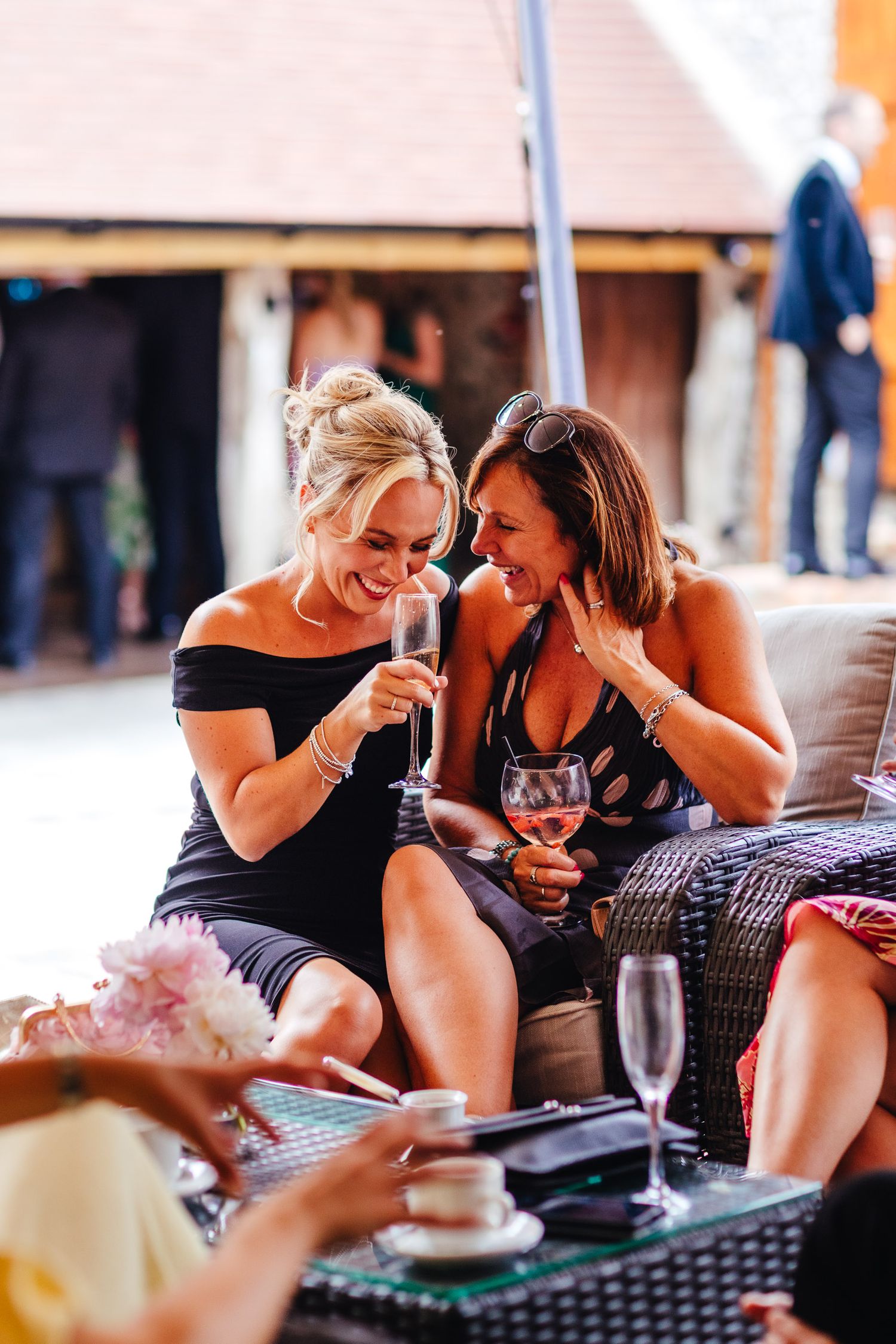 Relaxed guest moments at Derbyshire wedding reception, natural candid wedding photography
