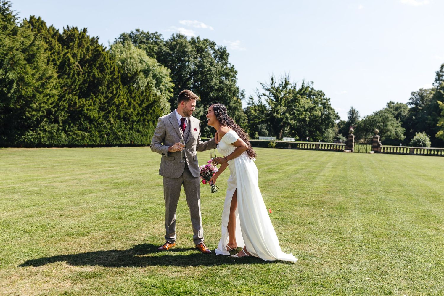 Couple portrait on the lawns at Bosworth Hall Warwickshire, elegant summer wedding photography