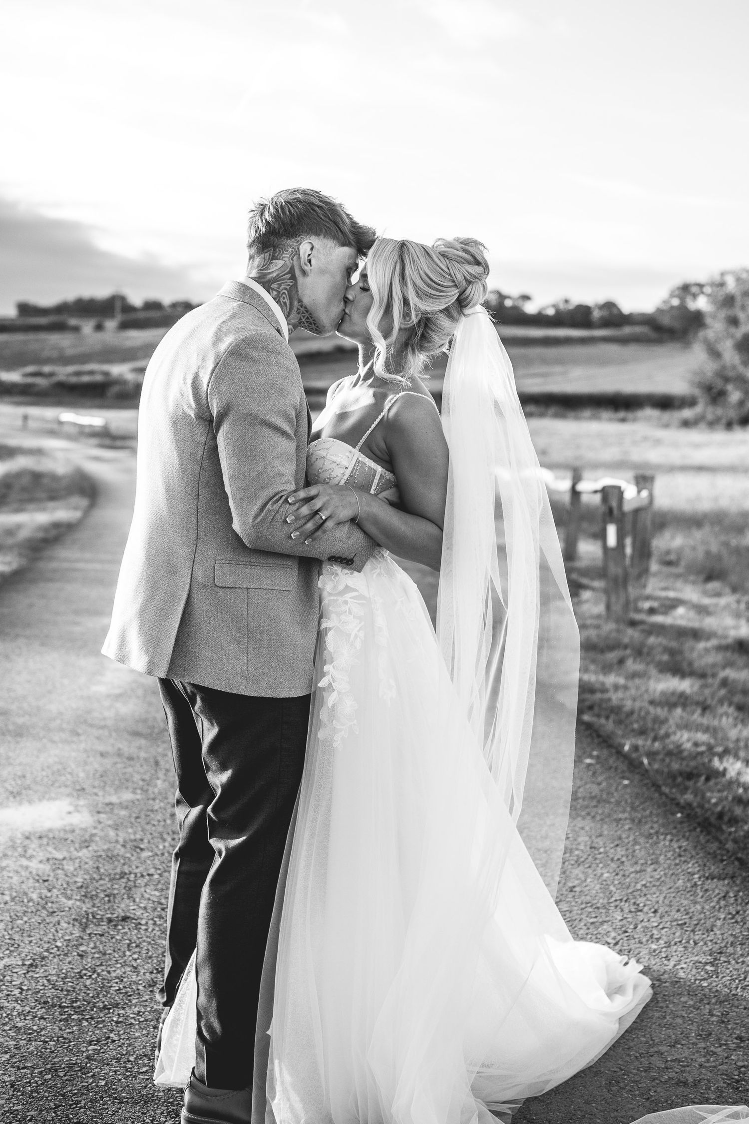 Grangefields Derbyshire sunset wedding photography, romantic golden hour couple portrait at exclusive East Midlands venue