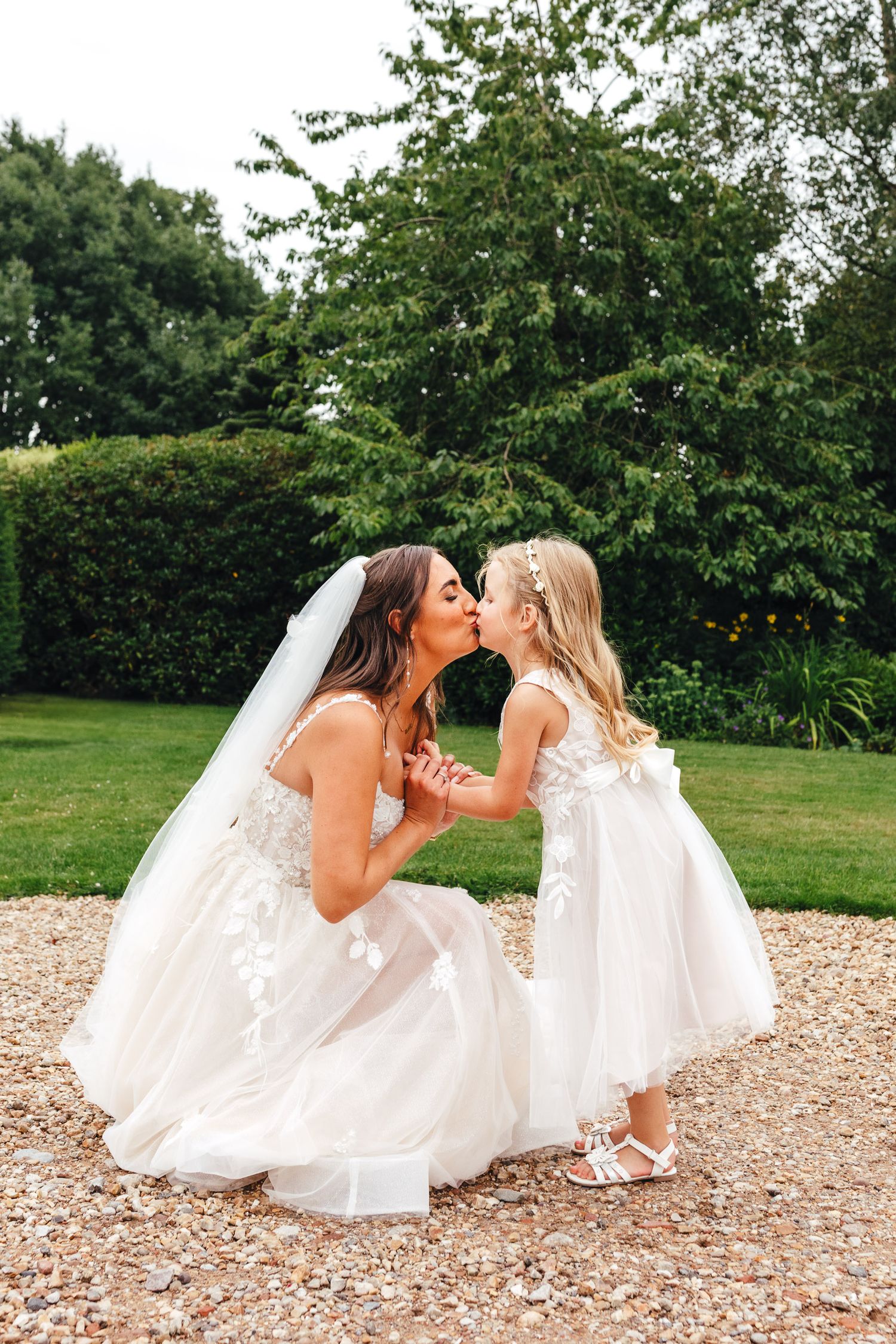 Bride and flower girl portrait at Shottle Hall wedding venue, Derbyshire wedding photographer Mimi Foster