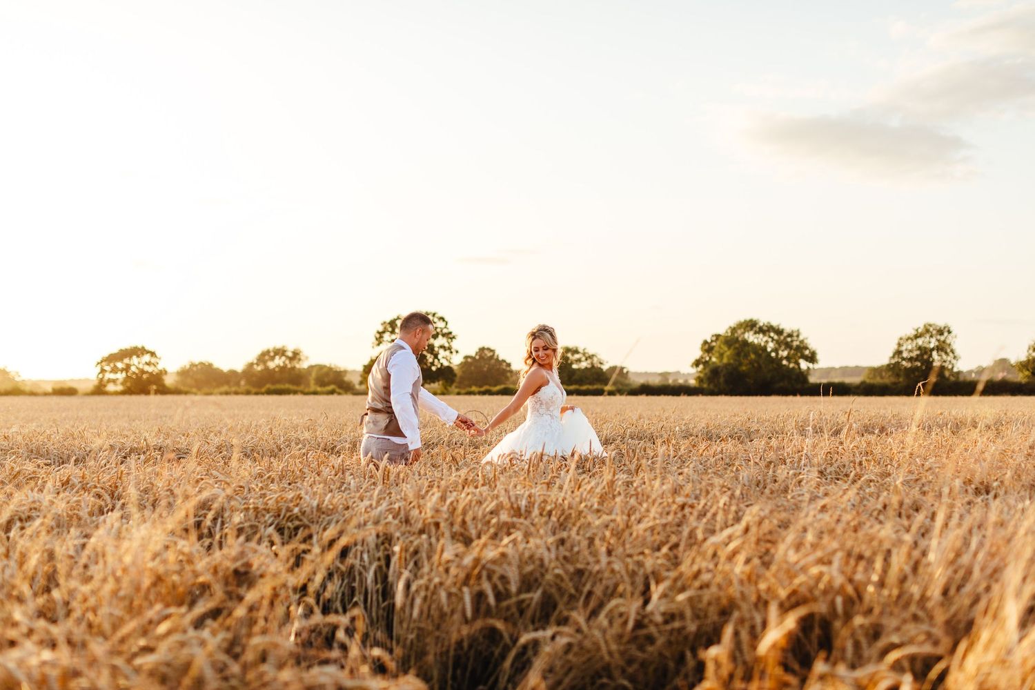 The Normans wedding York summer sunset portrait in golden fields, romantic North Yorkshire barn wedding photography