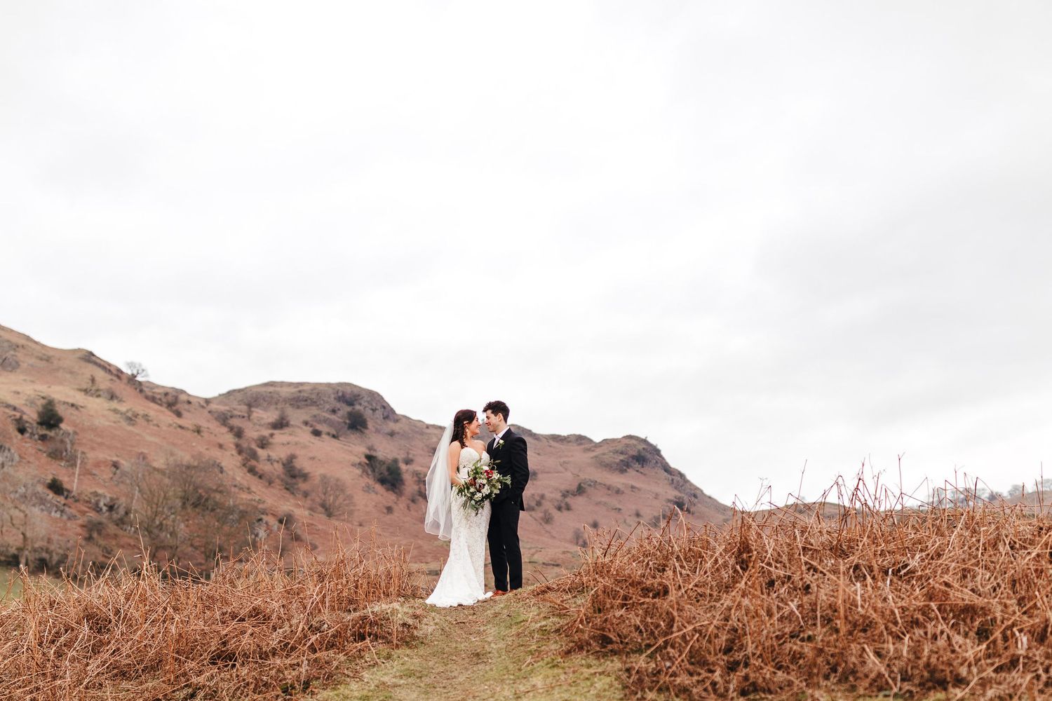 Romantic Lake District mountain wedding portrait, captured by Derbyshire wedding photographer Mimi Foster
