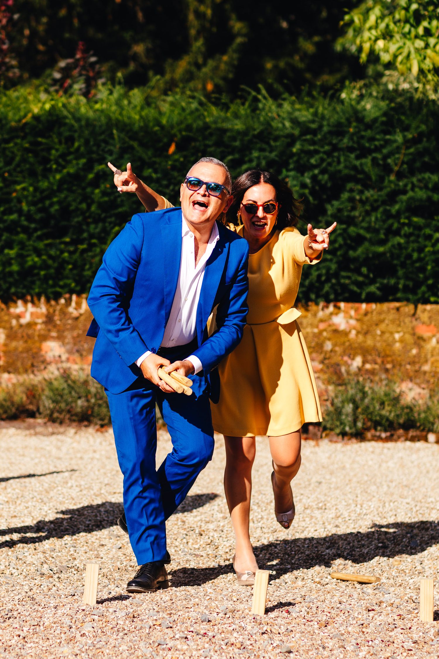 Fun wedding guest portrait at Kimbridge Barn Romsey, colourful summer wedding photography