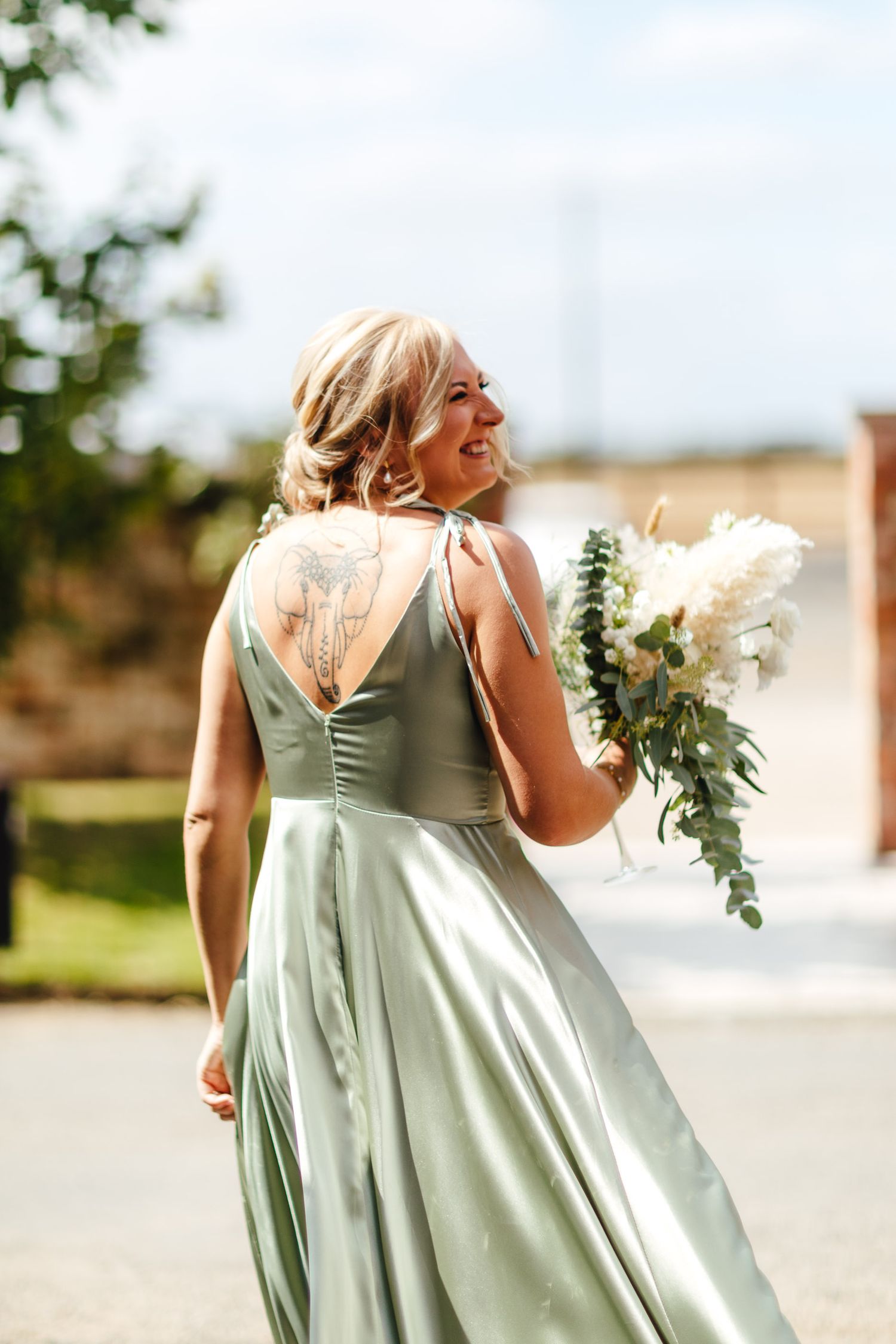 The Normans barn wedding York, candid bridal portrait outdoors, modern North Yorkshire wedding photography