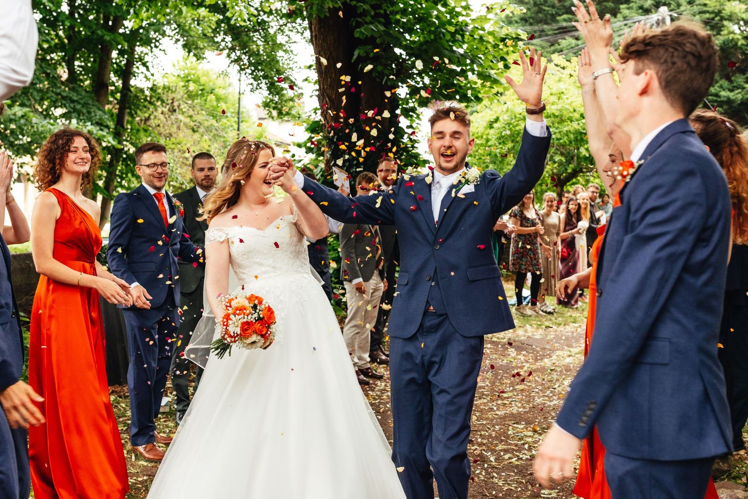 Confetti celebration at Winterbourne Medieval Barn wedding in Bristol