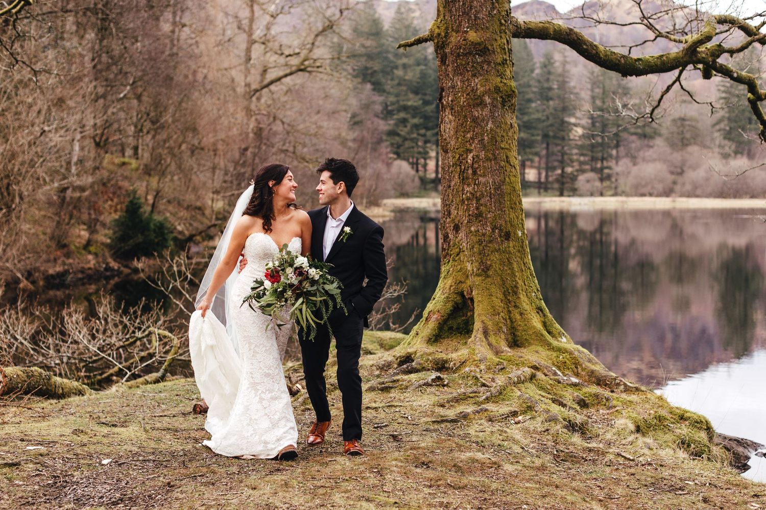 Bride and groom beside lake in the Lake District, photographed by Derbyshire wedding photographer