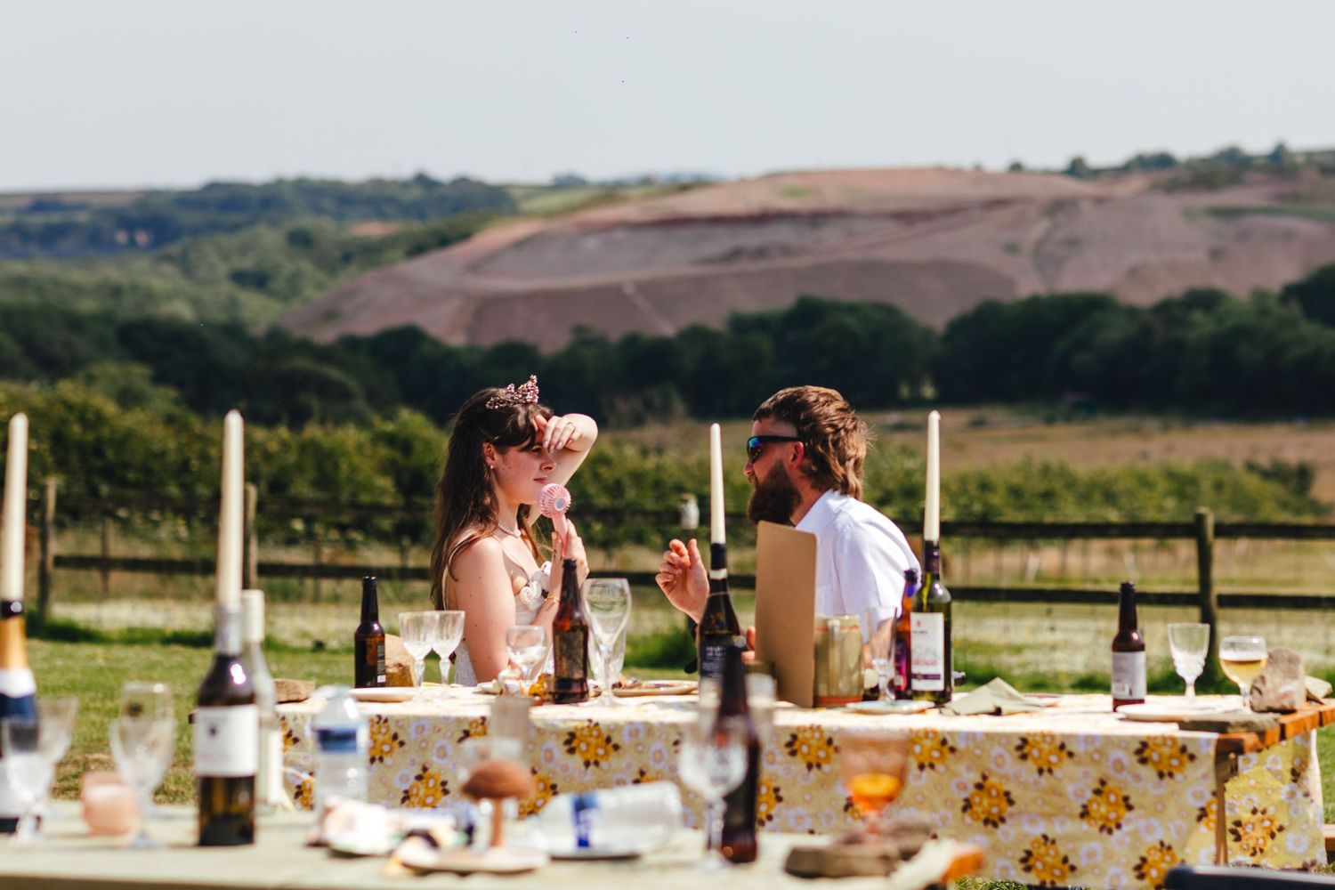 Outdoor wedding breakfast at family farm in Devon, relaxed countryside wedding photography