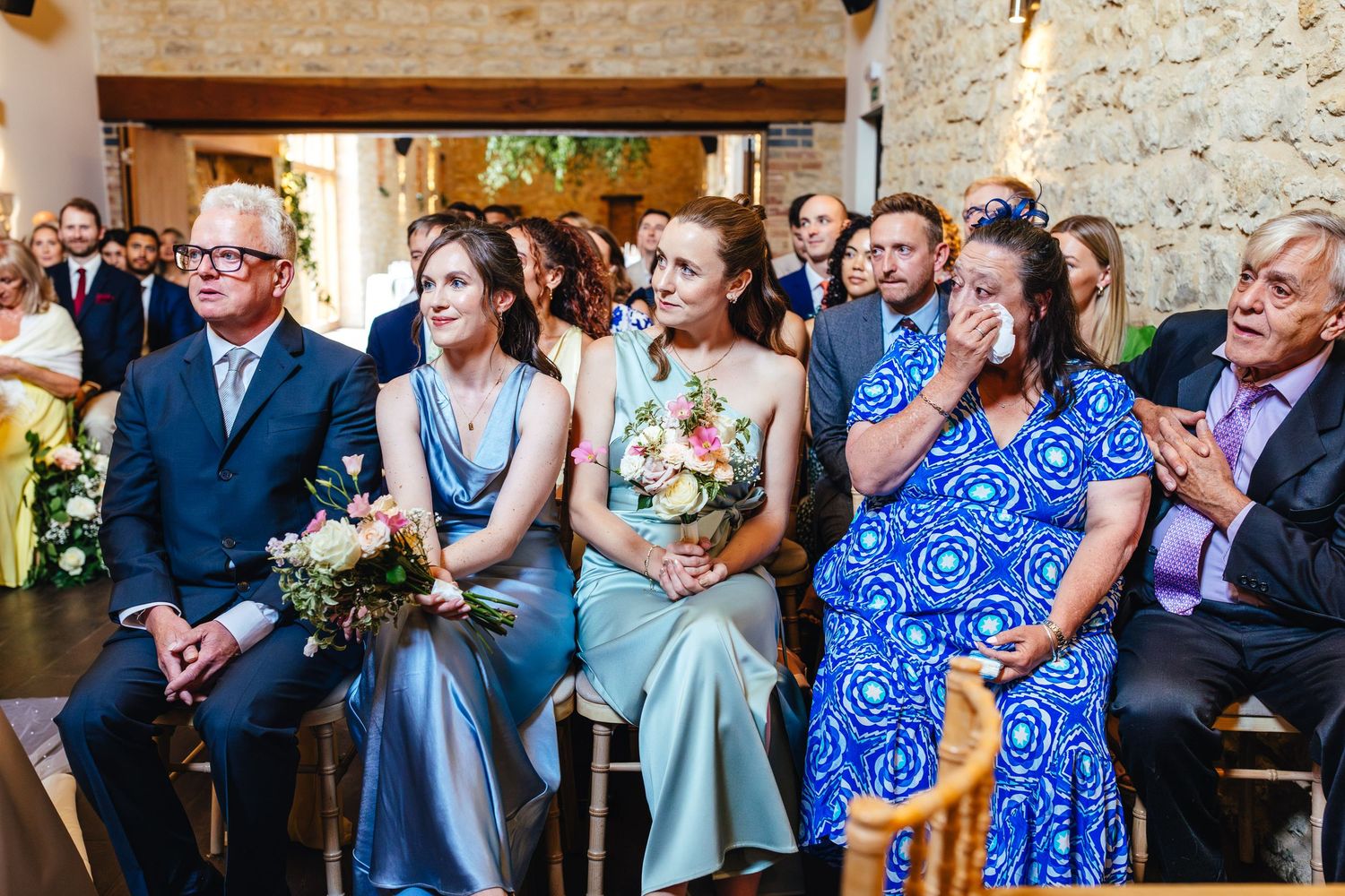 Emotional guests during Huntsmill Farm barn wedding ceremony, documentary wedding photography