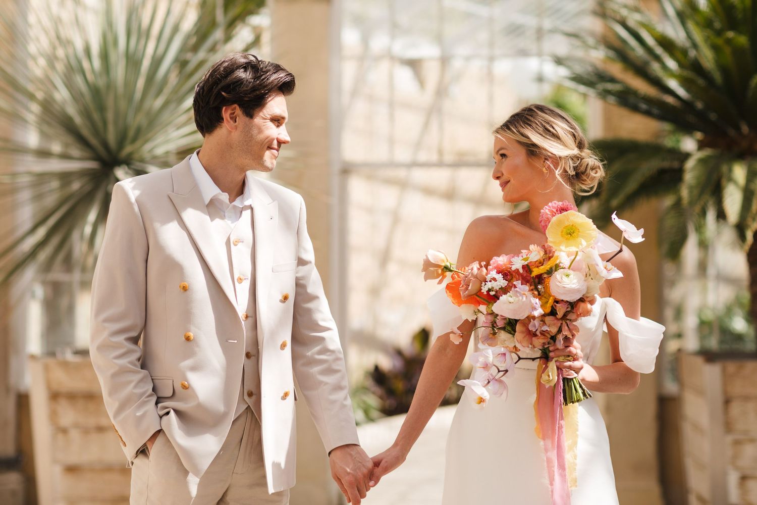 Romantic couple portrait at Syon Park London, modern spring wedding photography in historic glasshouse