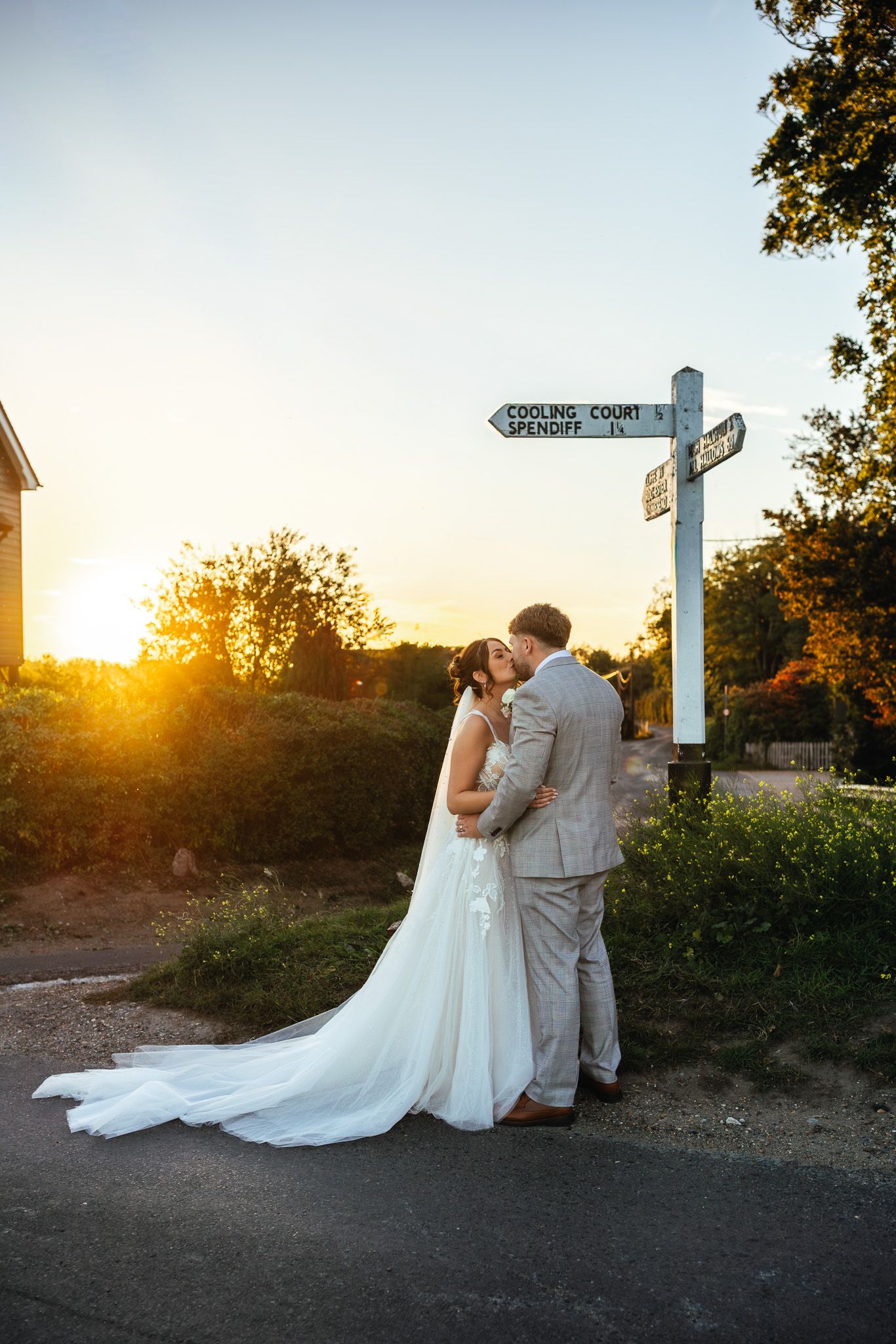 Golden hour couple portrait at Cooling Castle Barn, romantic barn wedding photography