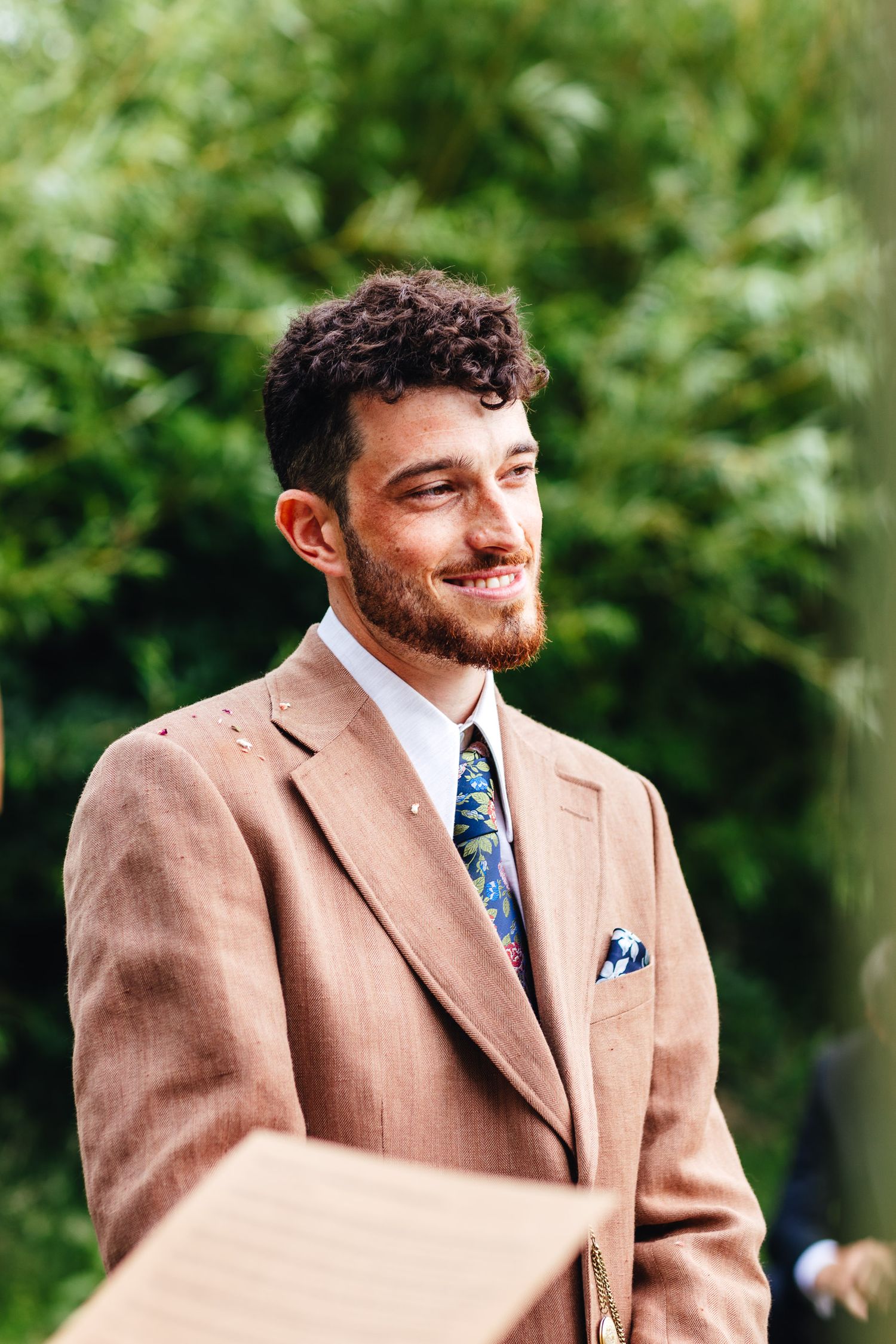 Groom ceremony portrait at relaxed outdoor wedding in Derbyshire, East Midlands