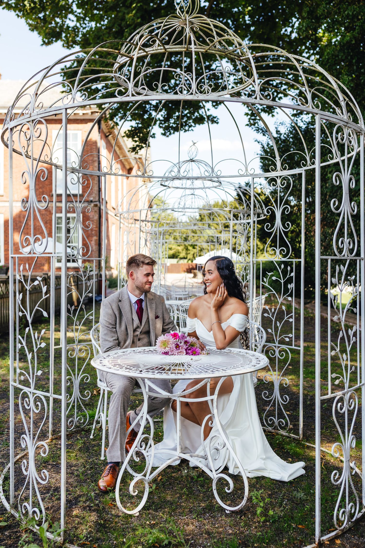 Romantic bird cage portrait at Bosworth Hall Warwickshire, natural wedding photography